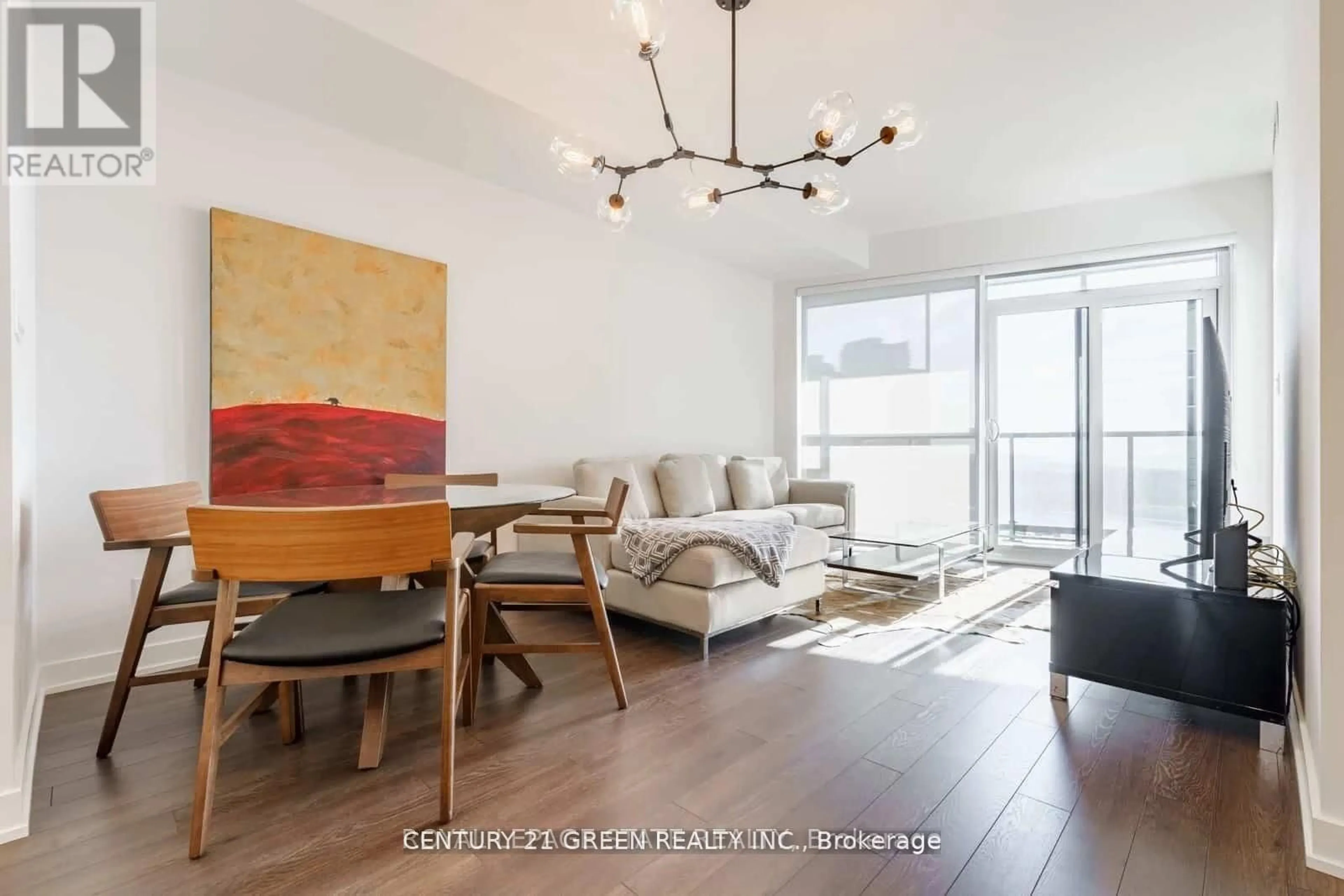 Living room with furniture, wood/laminate floor for 30 Ordnance St #1112, Toronto Ontario M6K 0C9