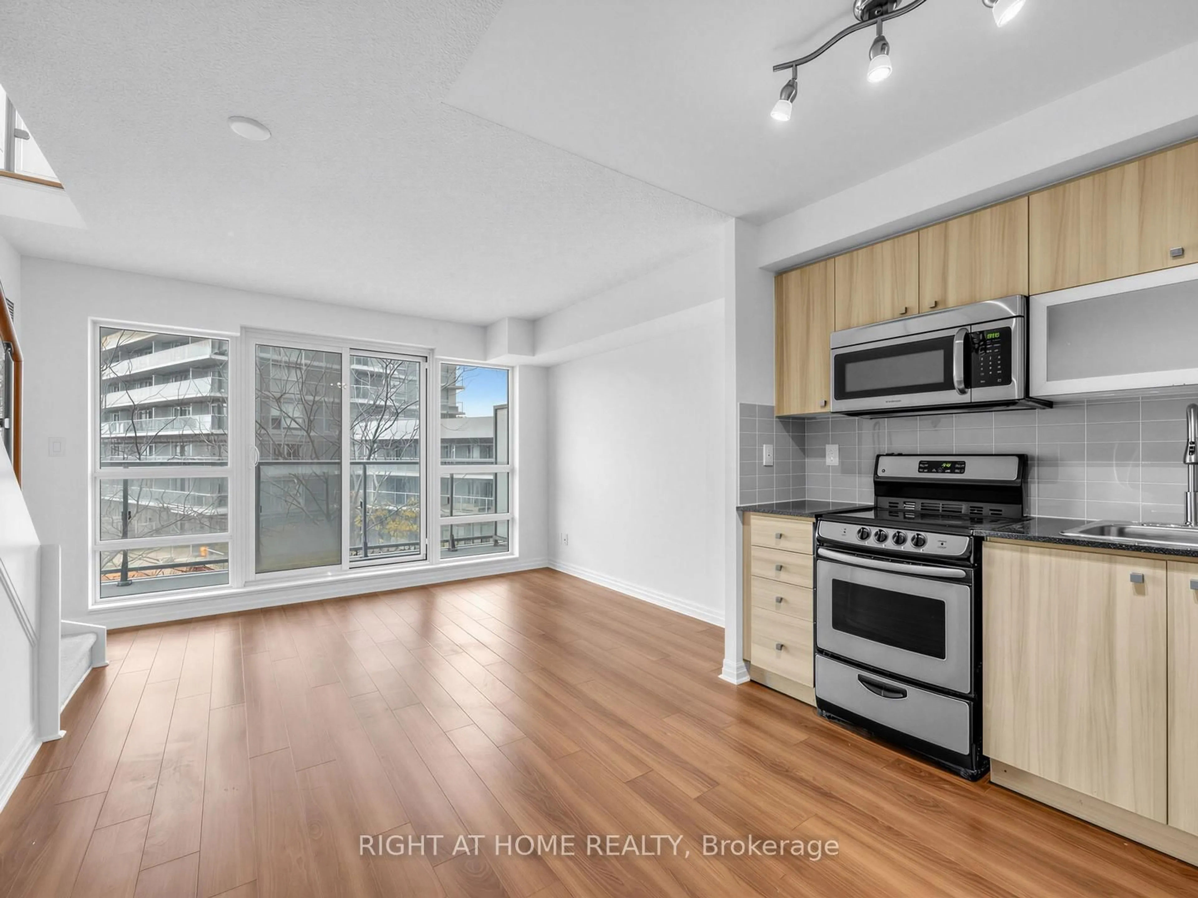 Open concept kitchen, wood/laminate floor for 2015 Sheppard Ave #318, Toronto Ontario M2J 0B3