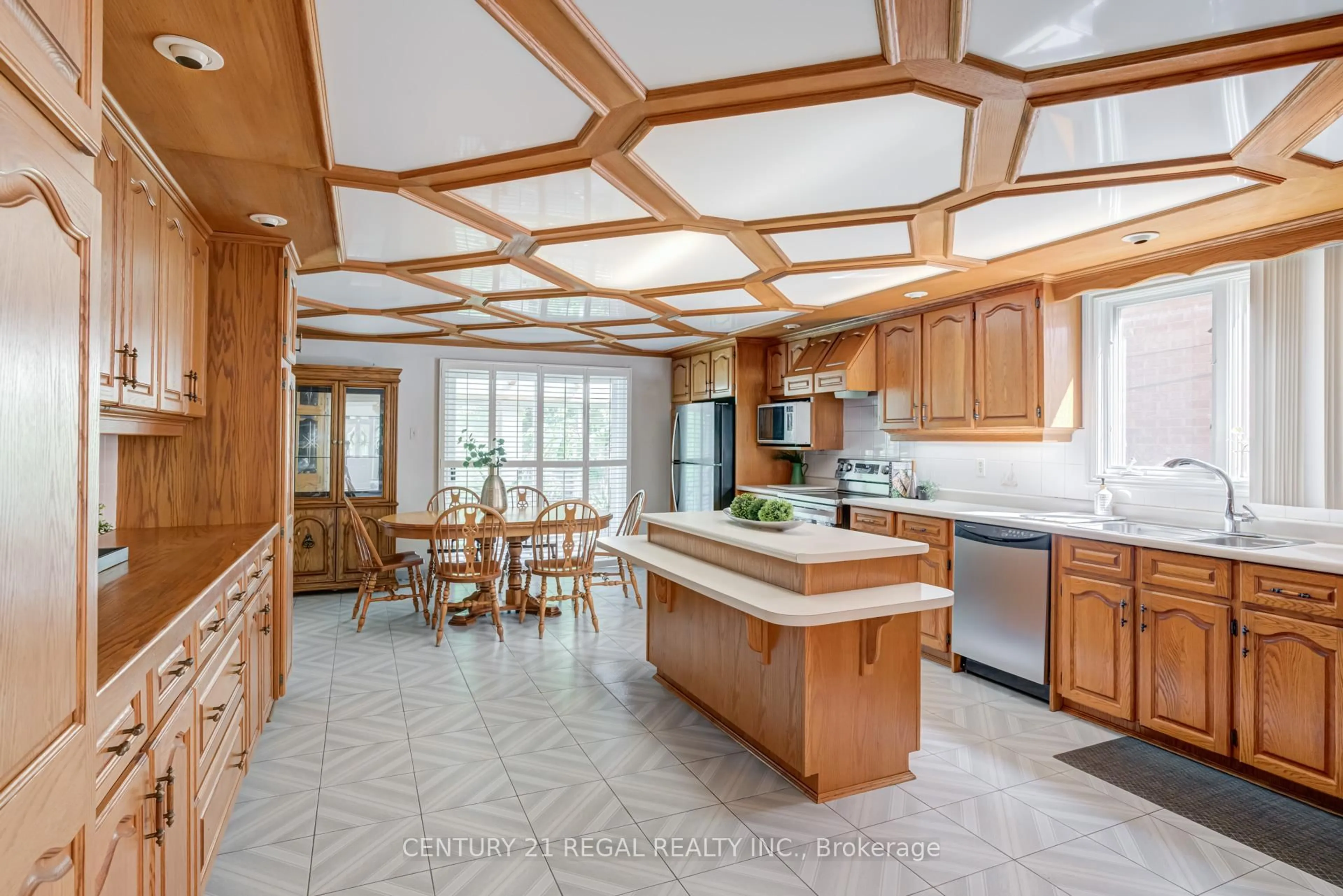 Open concept kitchen, ceramic/tile floor for 52 Ranee Ave, Toronto Ontario M6A 1M9