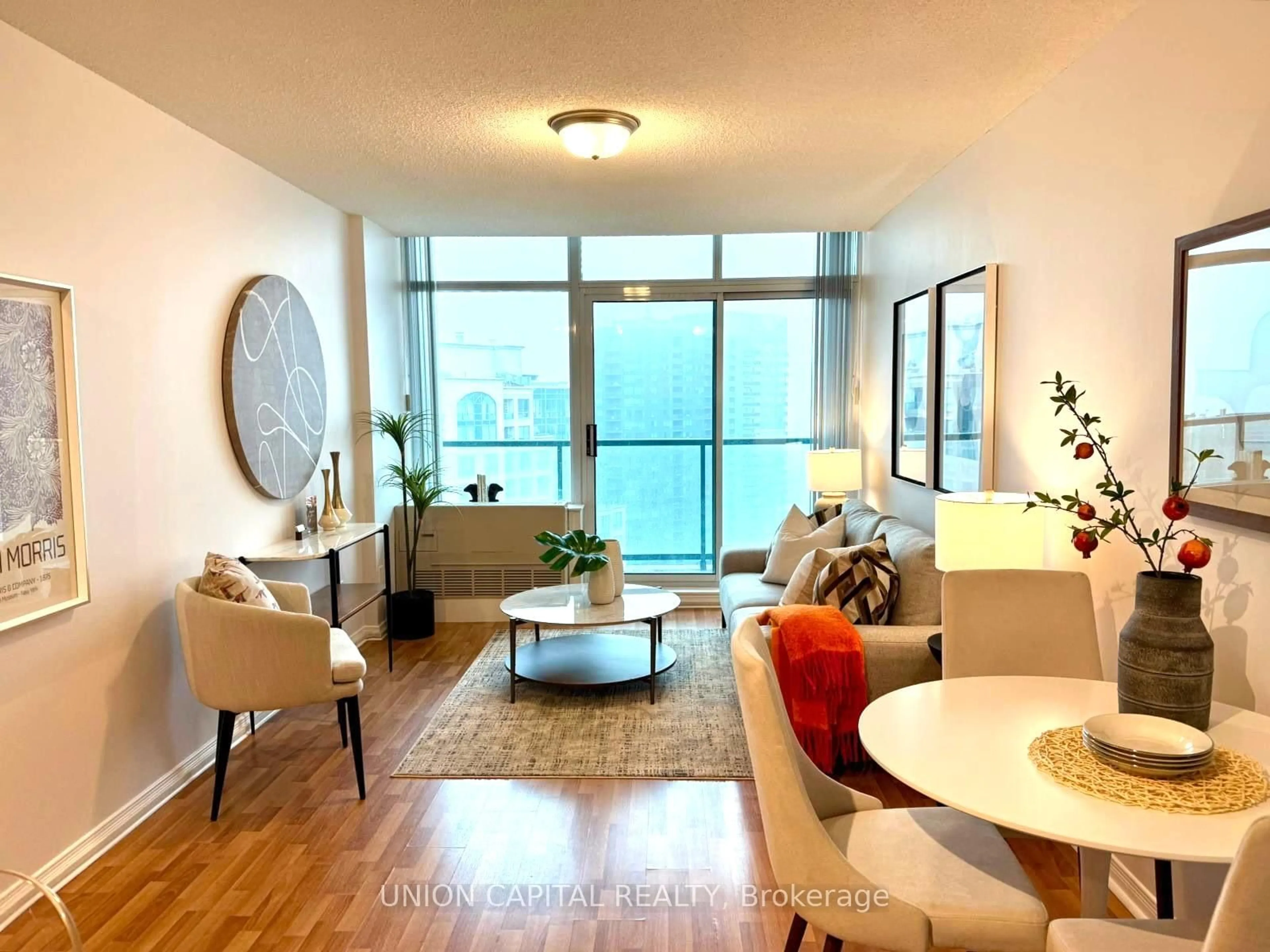 Living room with furniture, wood/laminate floor for 5508 Yonge St #PH07, Toronto Ontario M2N 7L2