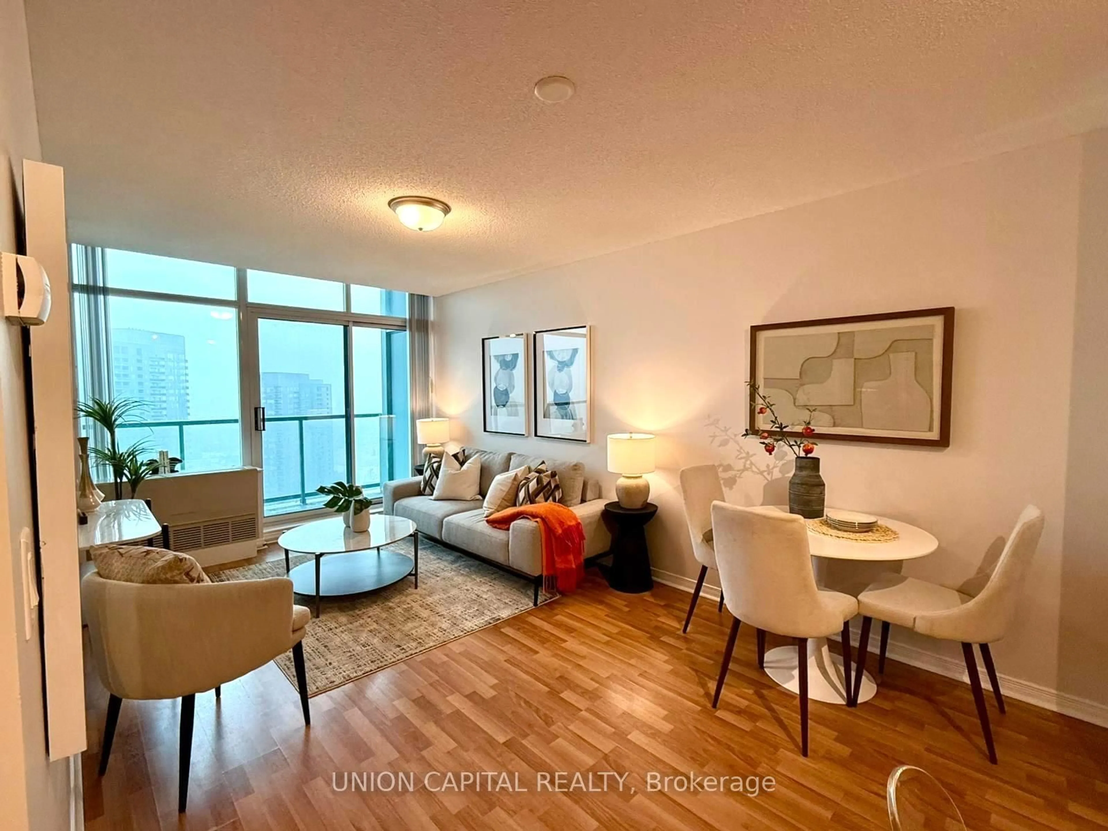 Living room with furniture, wood/laminate floor for 5508 Yonge St #PH07, Toronto Ontario M2N 7L2