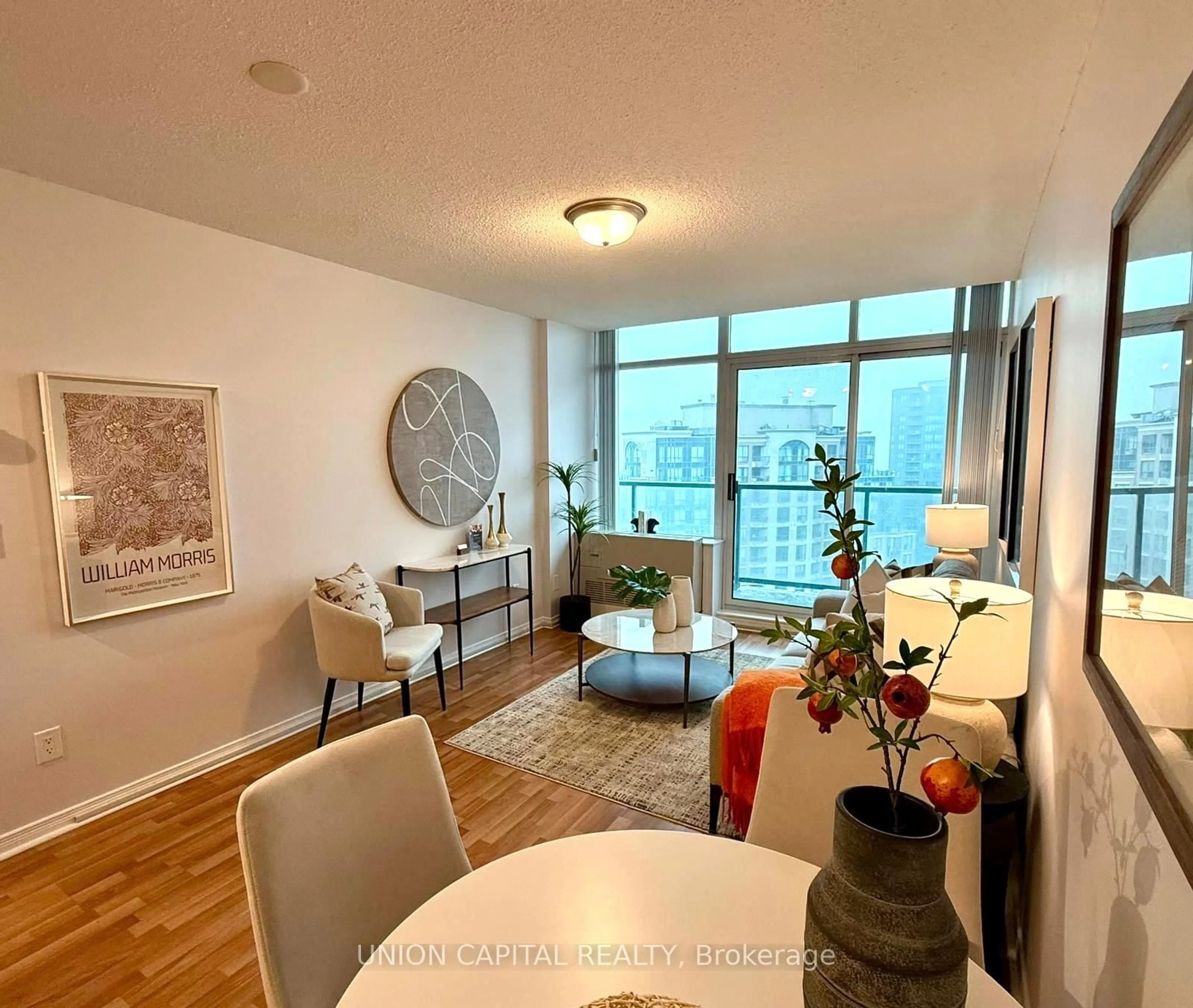 Living room with furniture, wood/laminate floor for 5508 Yonge St #PH07, Toronto Ontario M2N 7L2