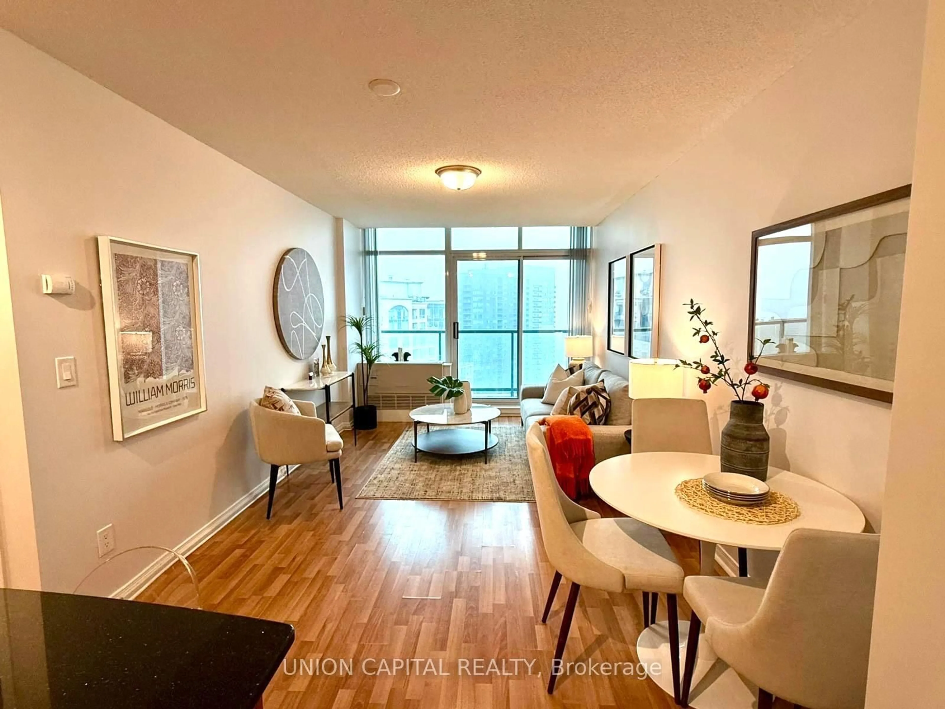 Living room with furniture, wood/laminate floor for 5508 Yonge St #PH07, Toronto Ontario M2N 7L2