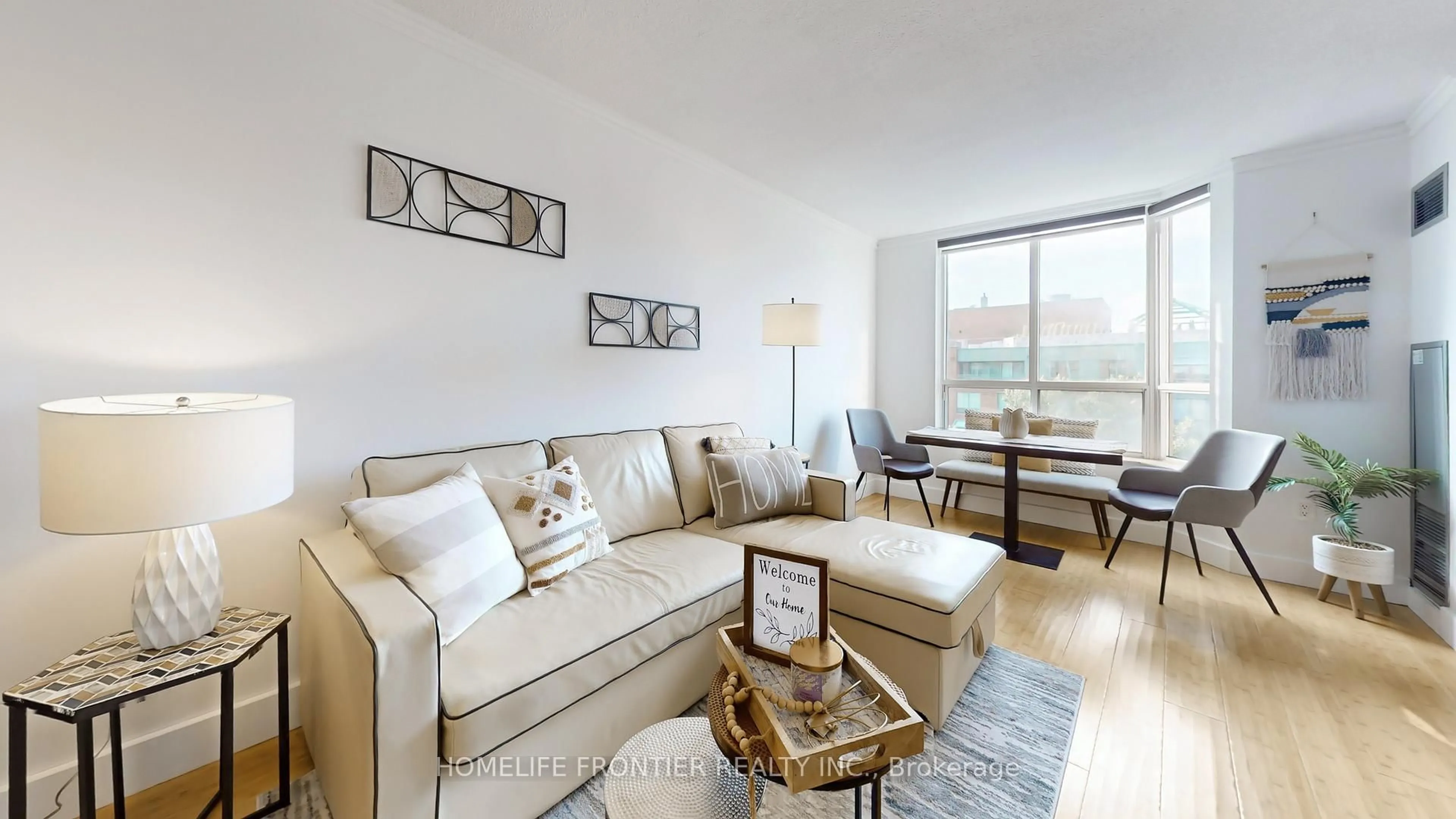 Living room with furniture, wood/laminate floor for 284 Bloor St #806, Toronto Ontario M5S 3B8