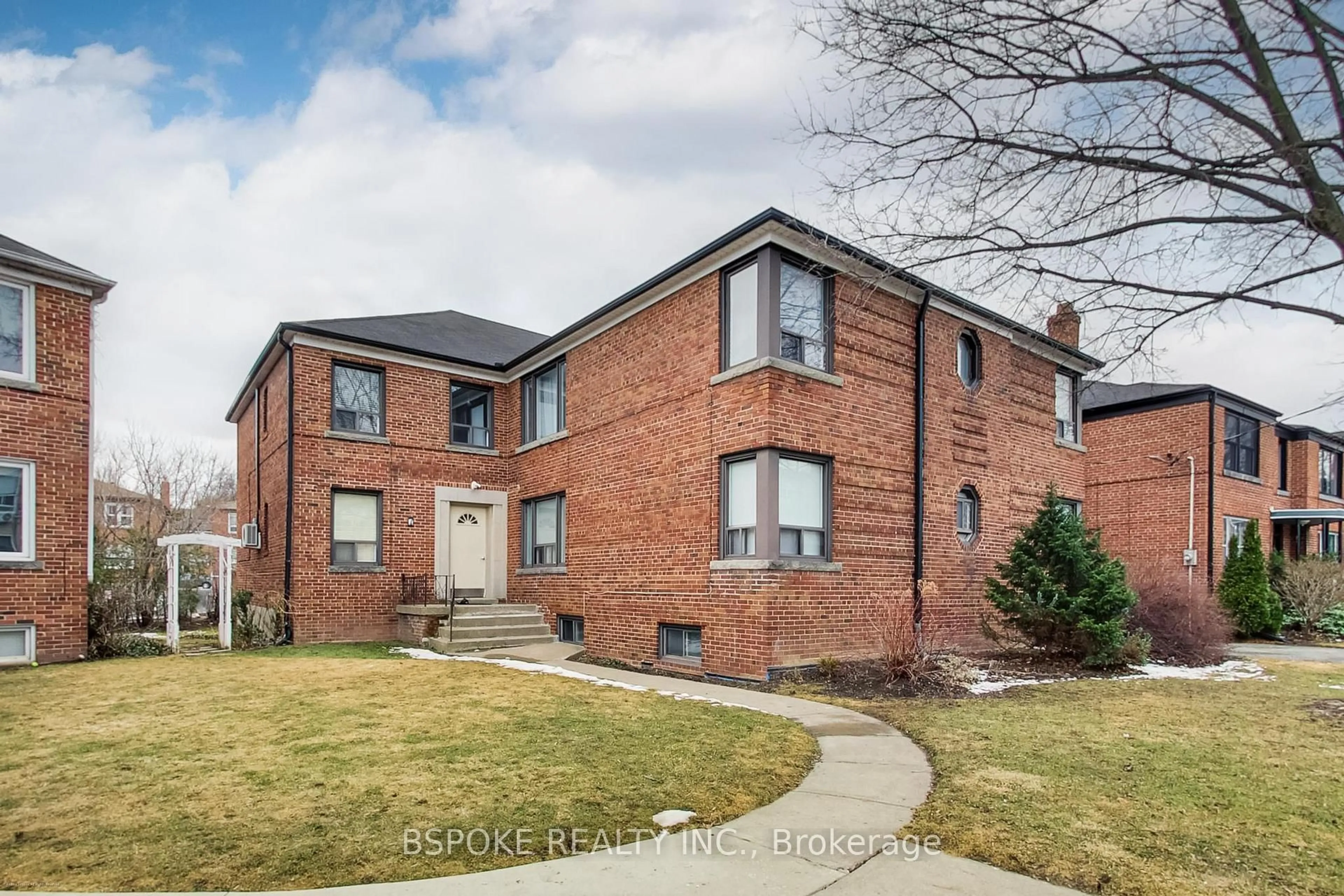 Home with brick exterior material, street for 7 Warwick Ave #3, Toronto Ontario M6C 1T5