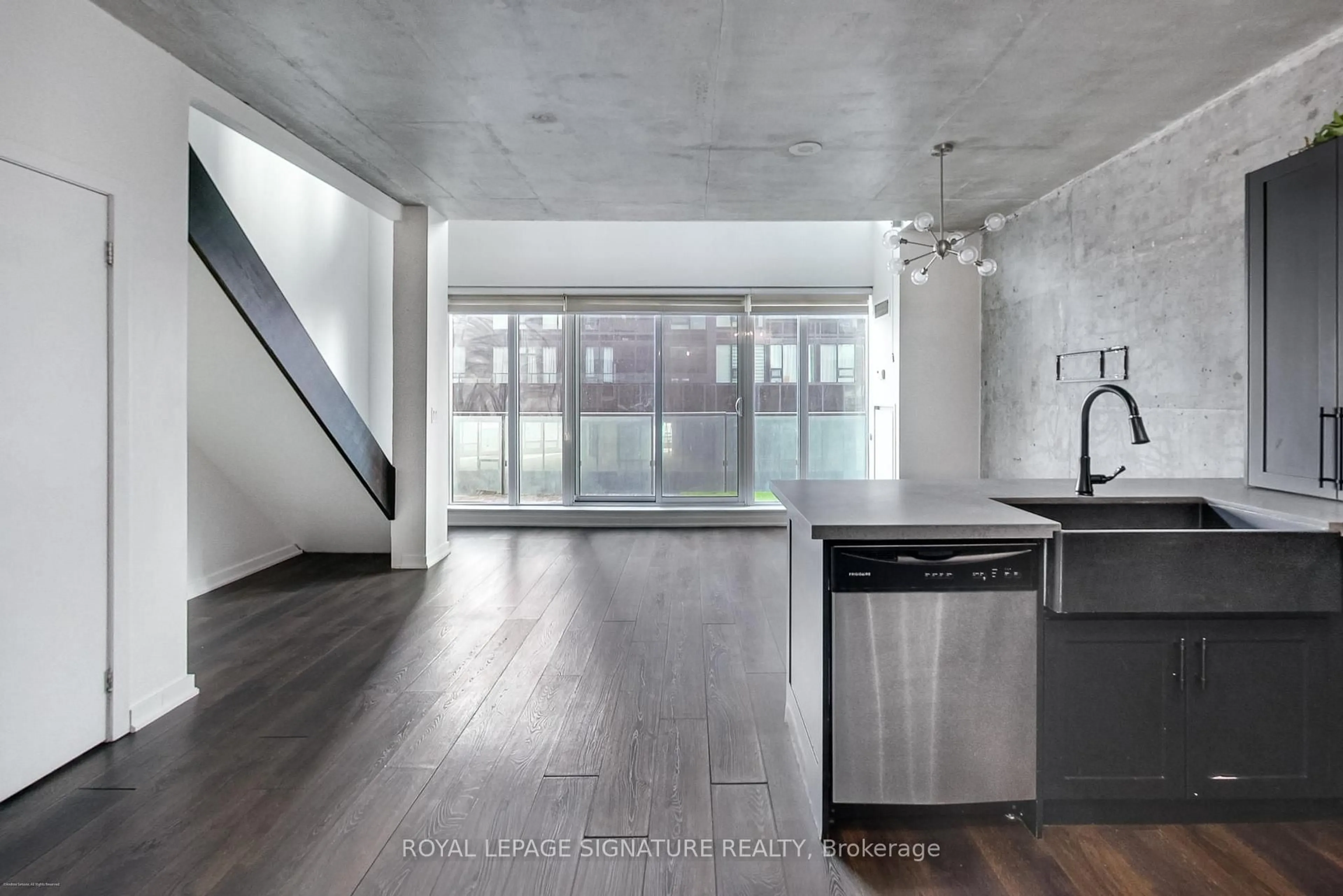 Open concept kitchen, cement floor for 150 East Liberty St #811, Toronto Ontario M6K 3R5
