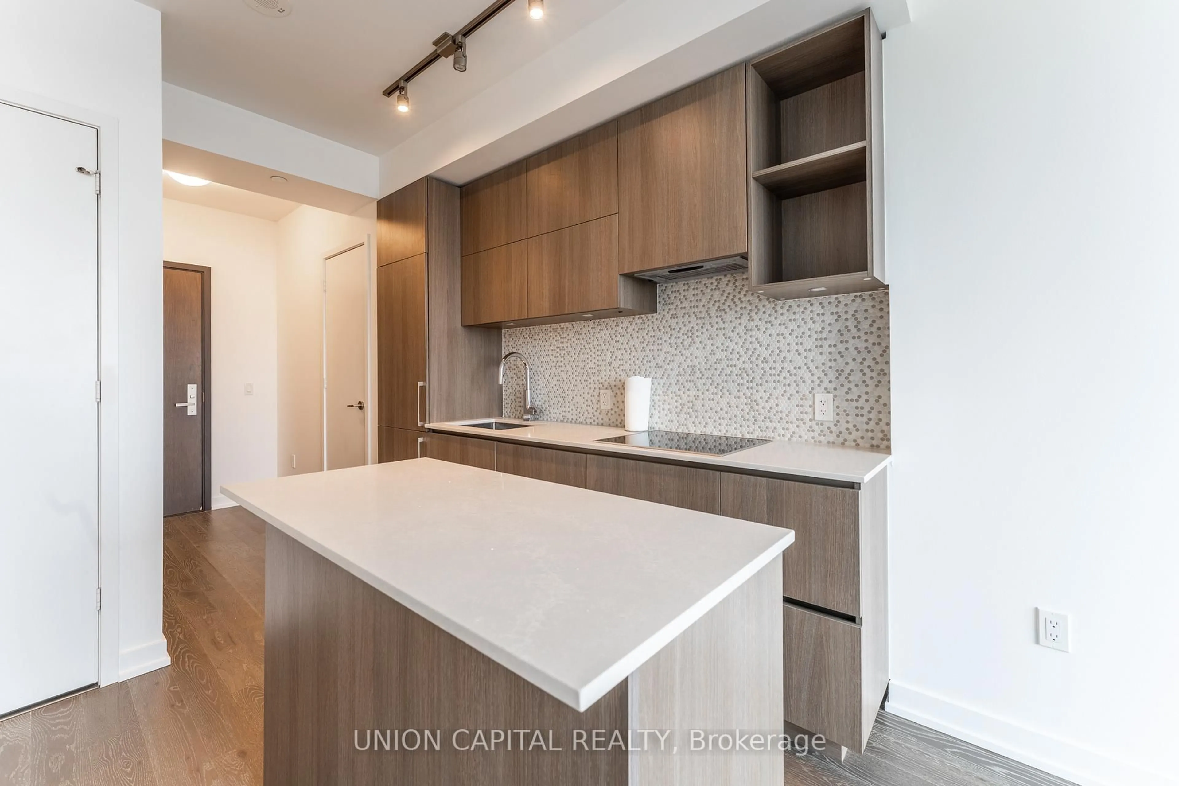Open concept kitchen, wood/laminate floor for 1 Yorkville Ave #3709, Toronto Ontario M4W 0B1