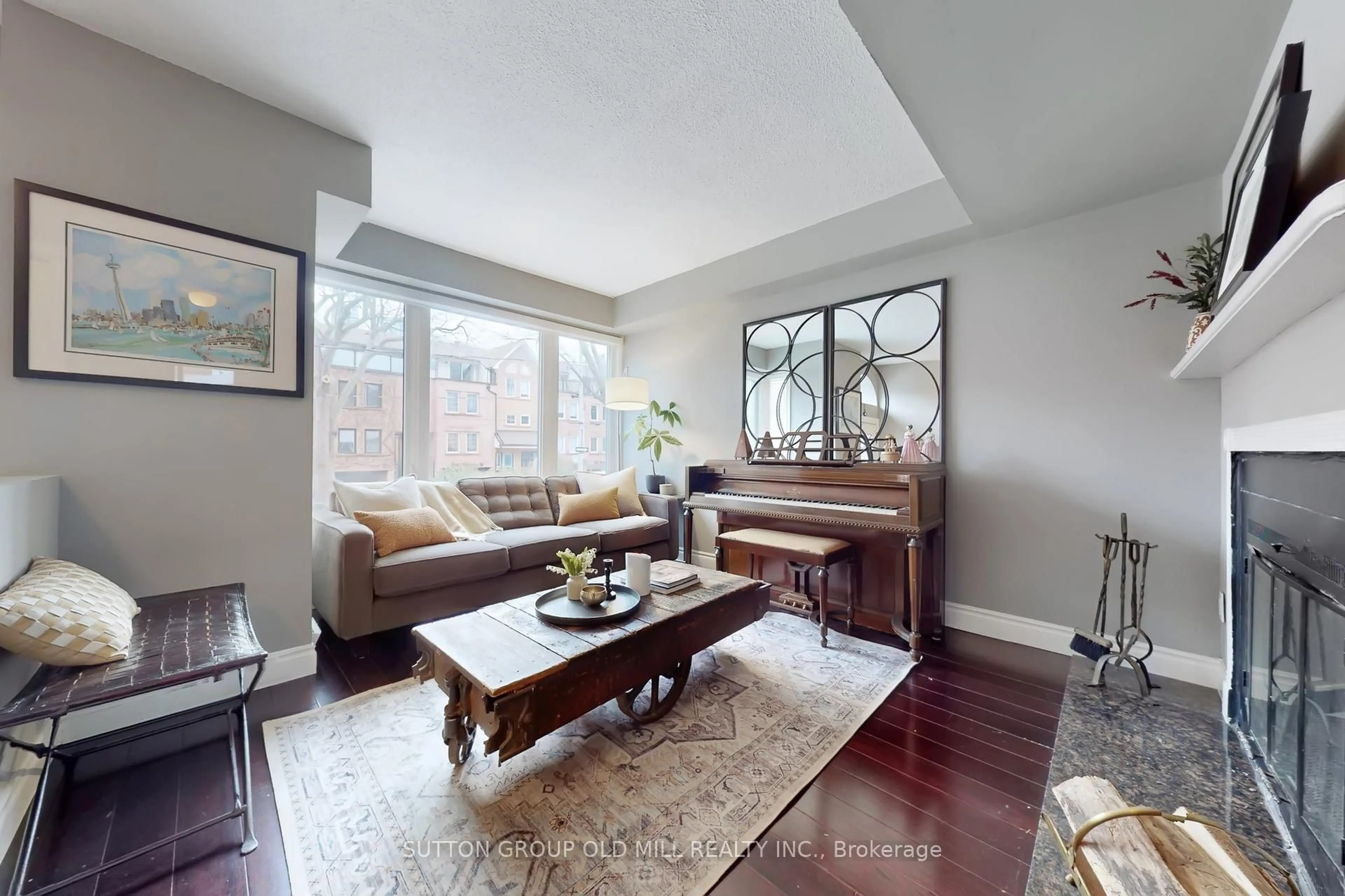 Living room with furniture, wood/laminate floor for 223 Berkeley St, Toronto Ontario M5A 2X3