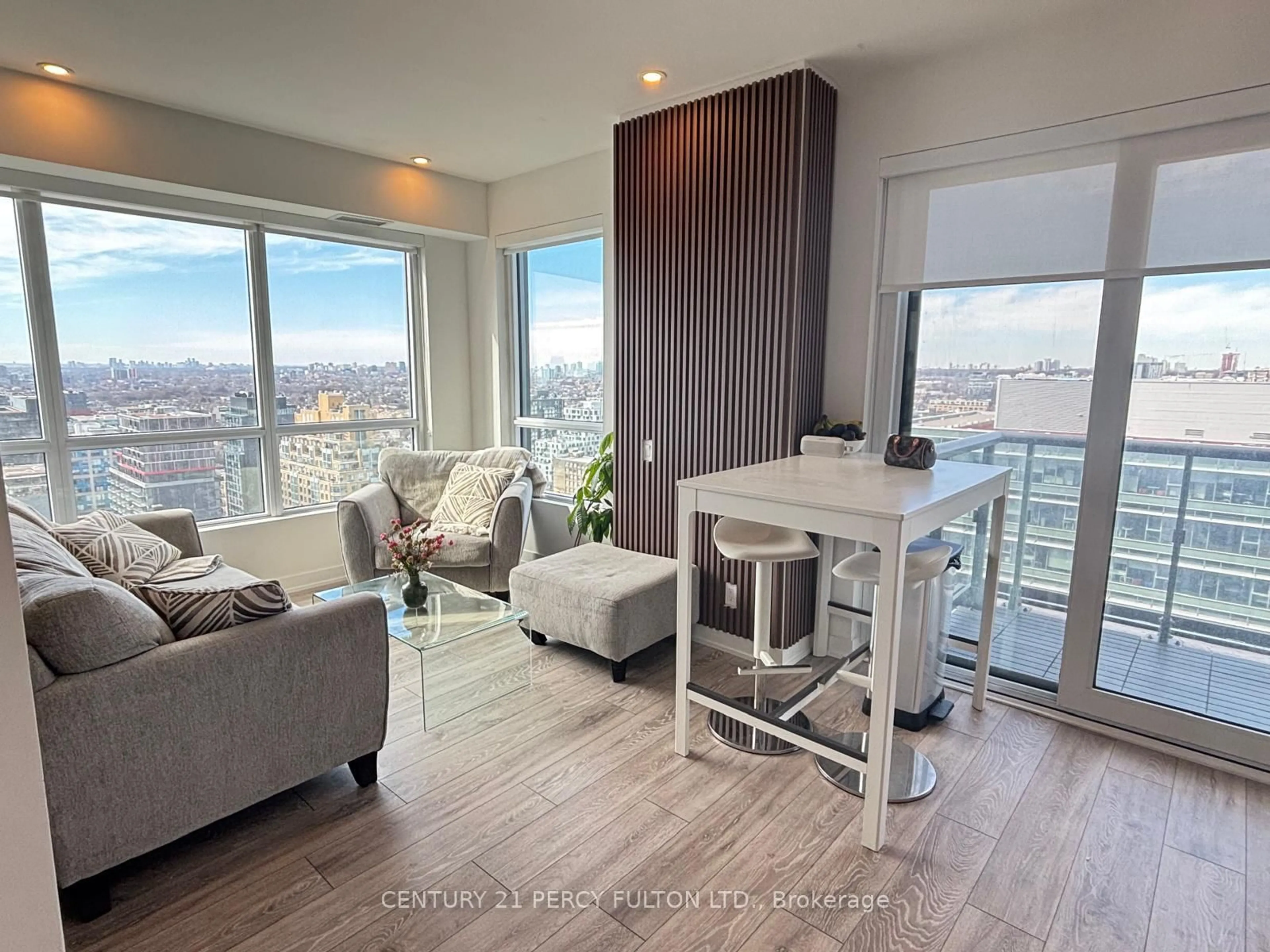 Living room with furniture, wood/laminate floor for 108 Peter St #2613, Toronto Ontario M5V 0W2