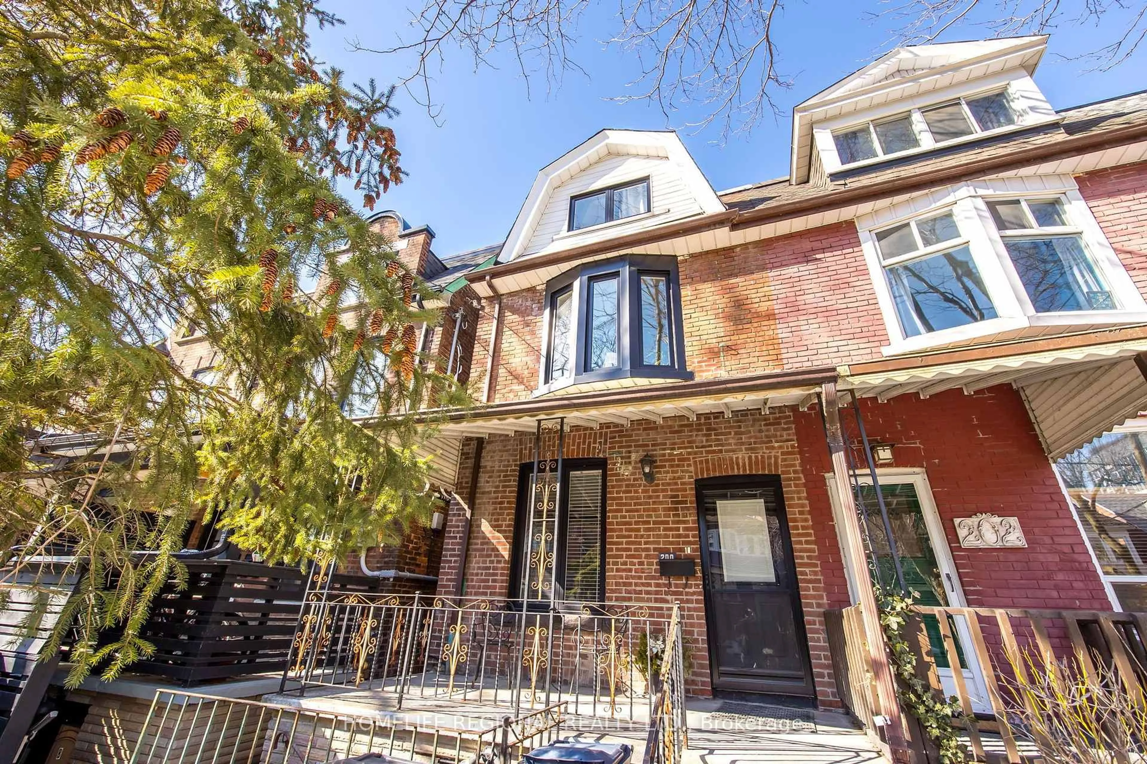 Home with brick exterior material, street for 200 Roxton Rd, Toronto Ontario M6J 2Y5
