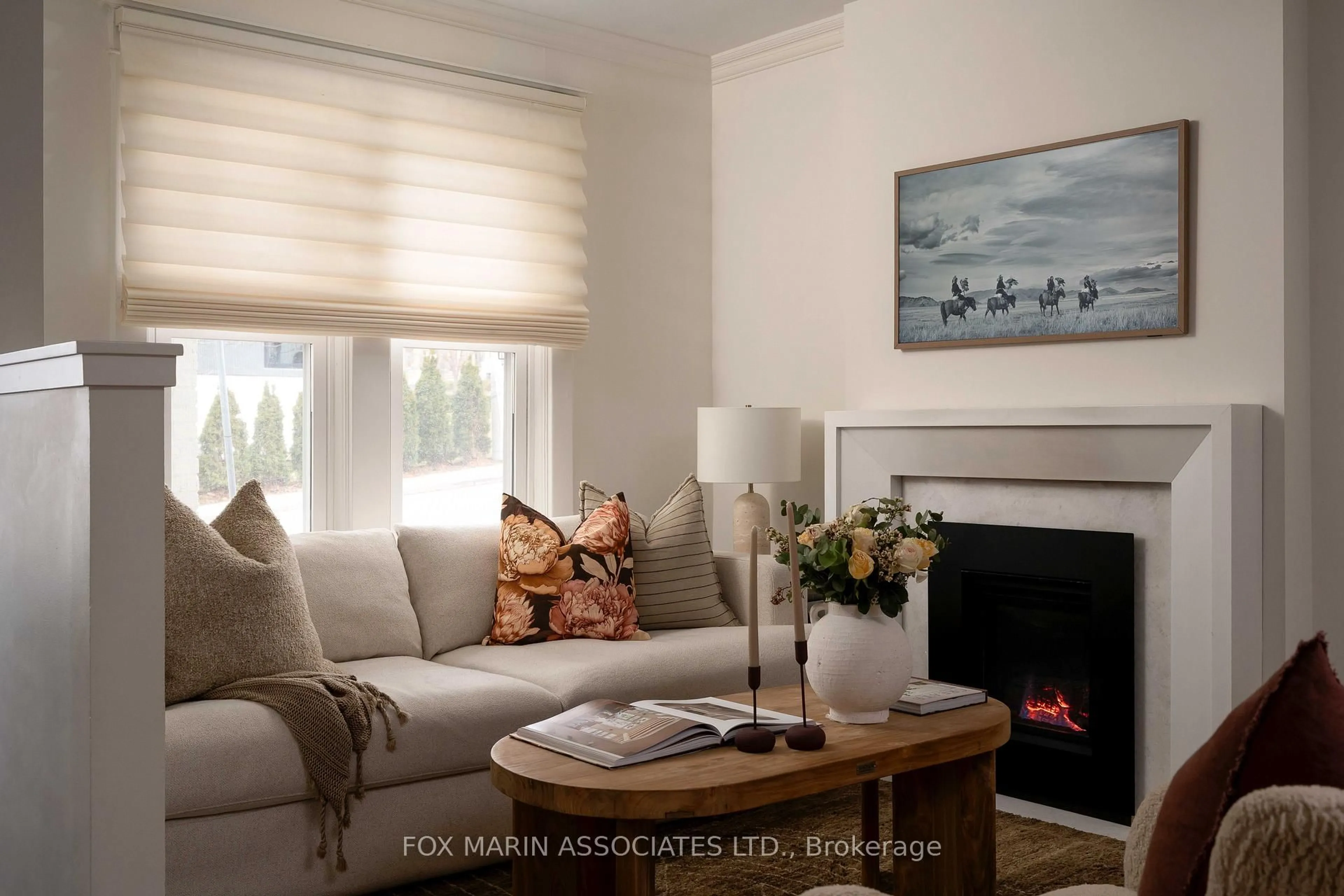 Living room with furniture, wood/laminate floor for 266 Roselawn Ave, Toronto Ontario M4R 1E9