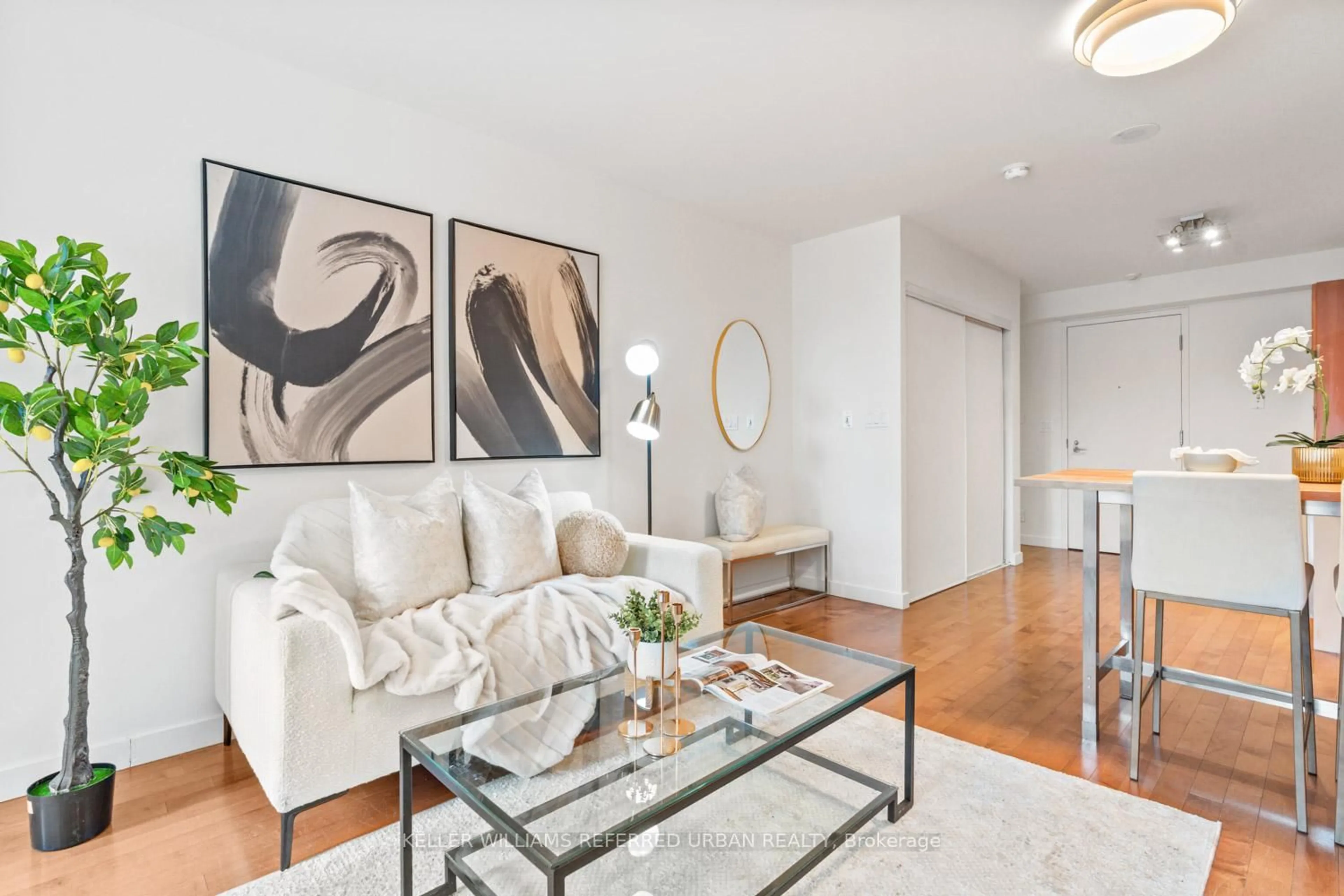 Living room with furniture, wood/laminate floor for 1005 King St #341, Toronto Ontario M6K 3M8