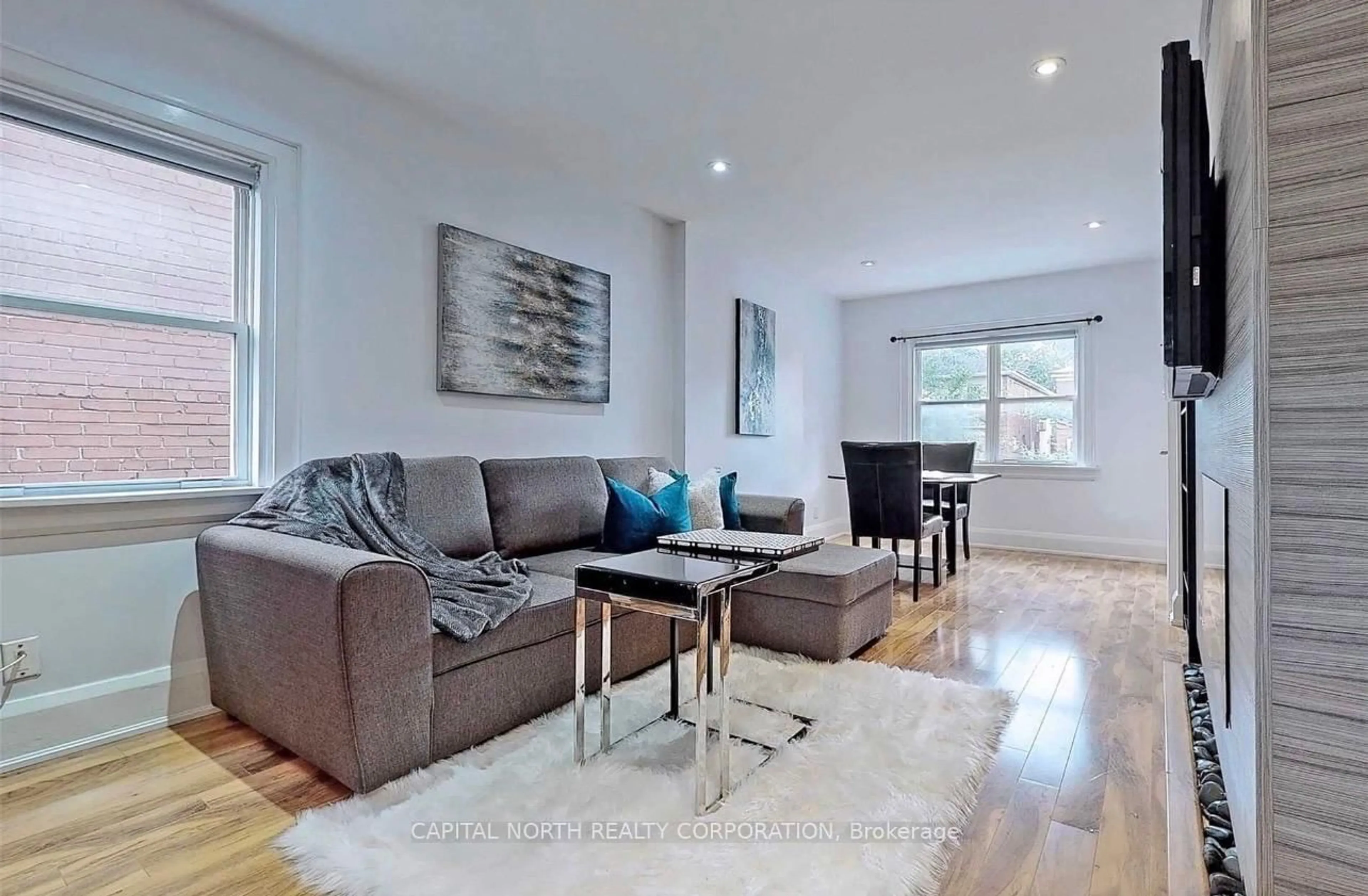 Living room with furniture, wood/laminate floor for 4 Belle Ayre Blvd, Toronto Ontario M4S 2P7