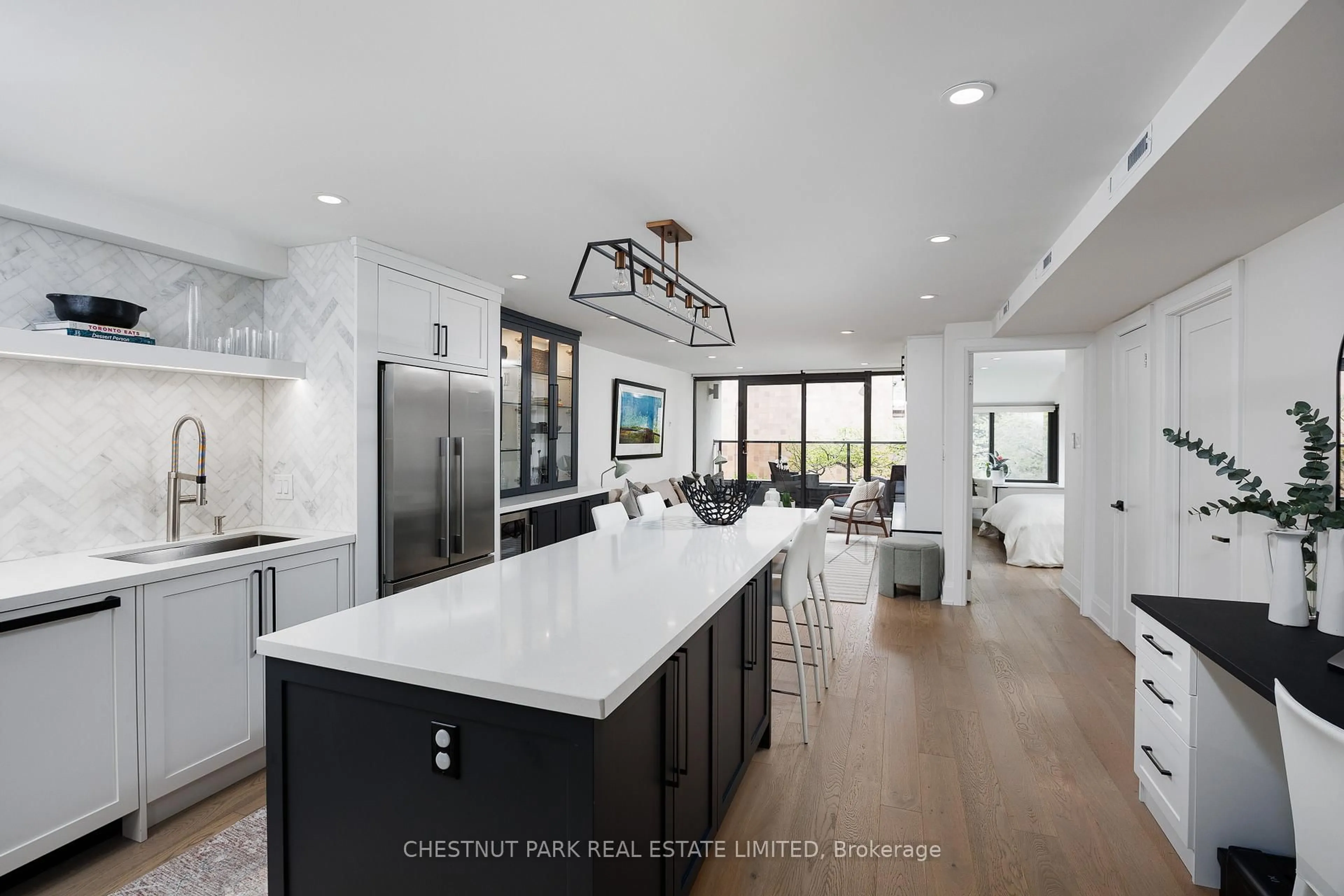 Open concept kitchen, ceramic/tile floor for 40 Oaklands Ave #203, Toronto Ontario M4V 2Z3