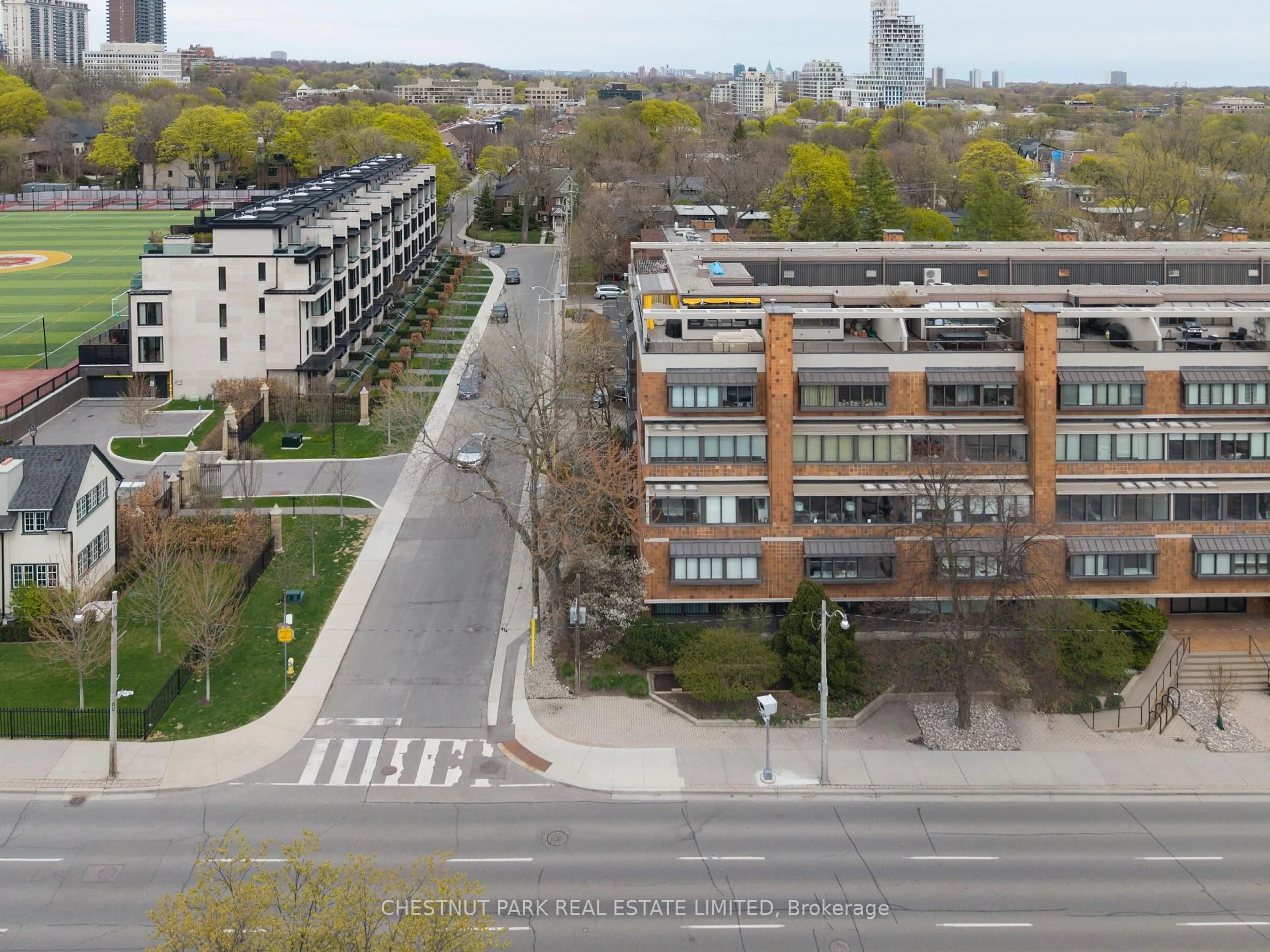 A pic from outside/outdoor area/front of a property/back of a property/a pic from drone, city buildings view from balcony for 40 Oaklands Ave #203, Toronto Ontario M4V 2Z3