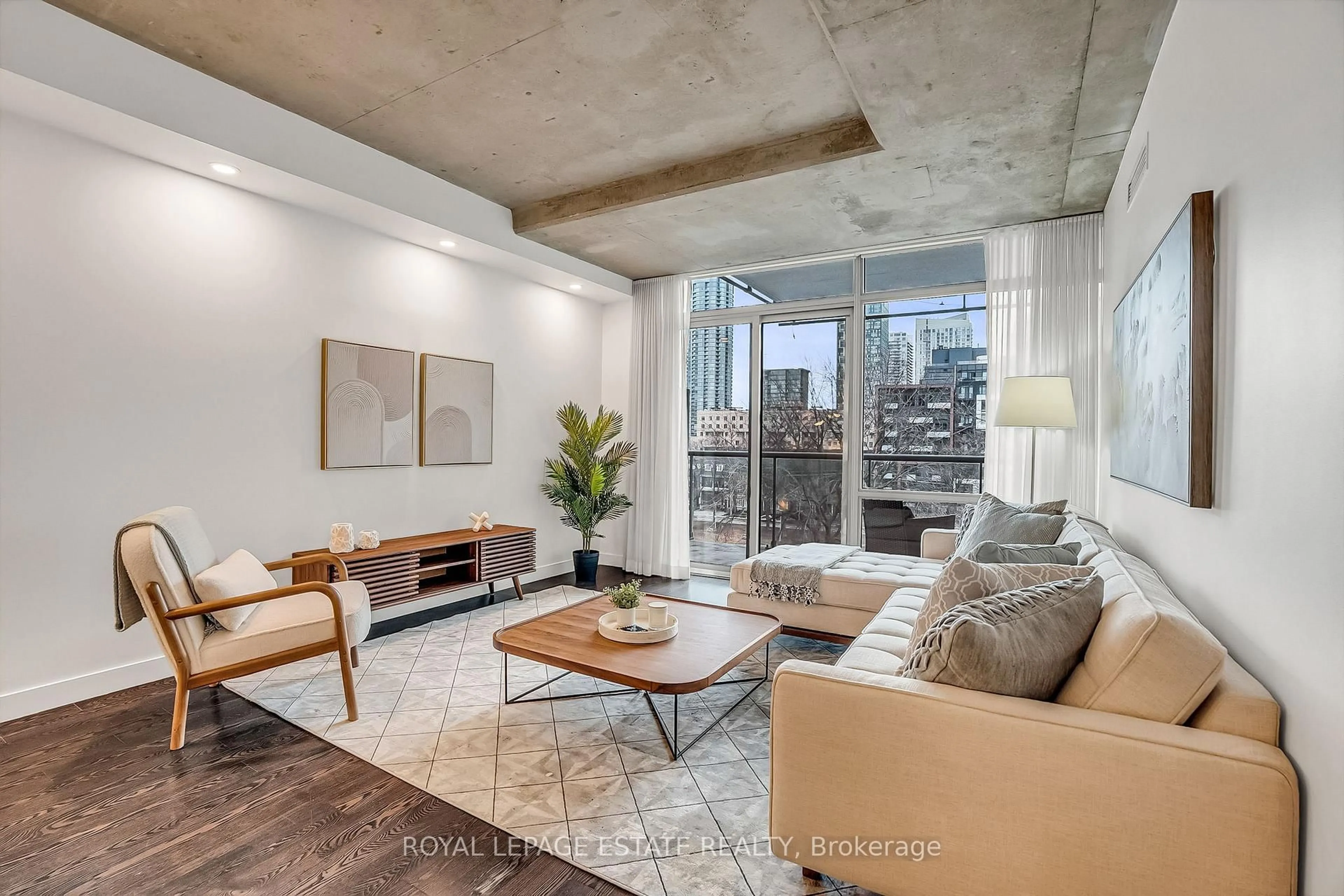 Living room with furniture, cement floor for 55 Stewart St #636, Toronto Ontario M5V 2V1