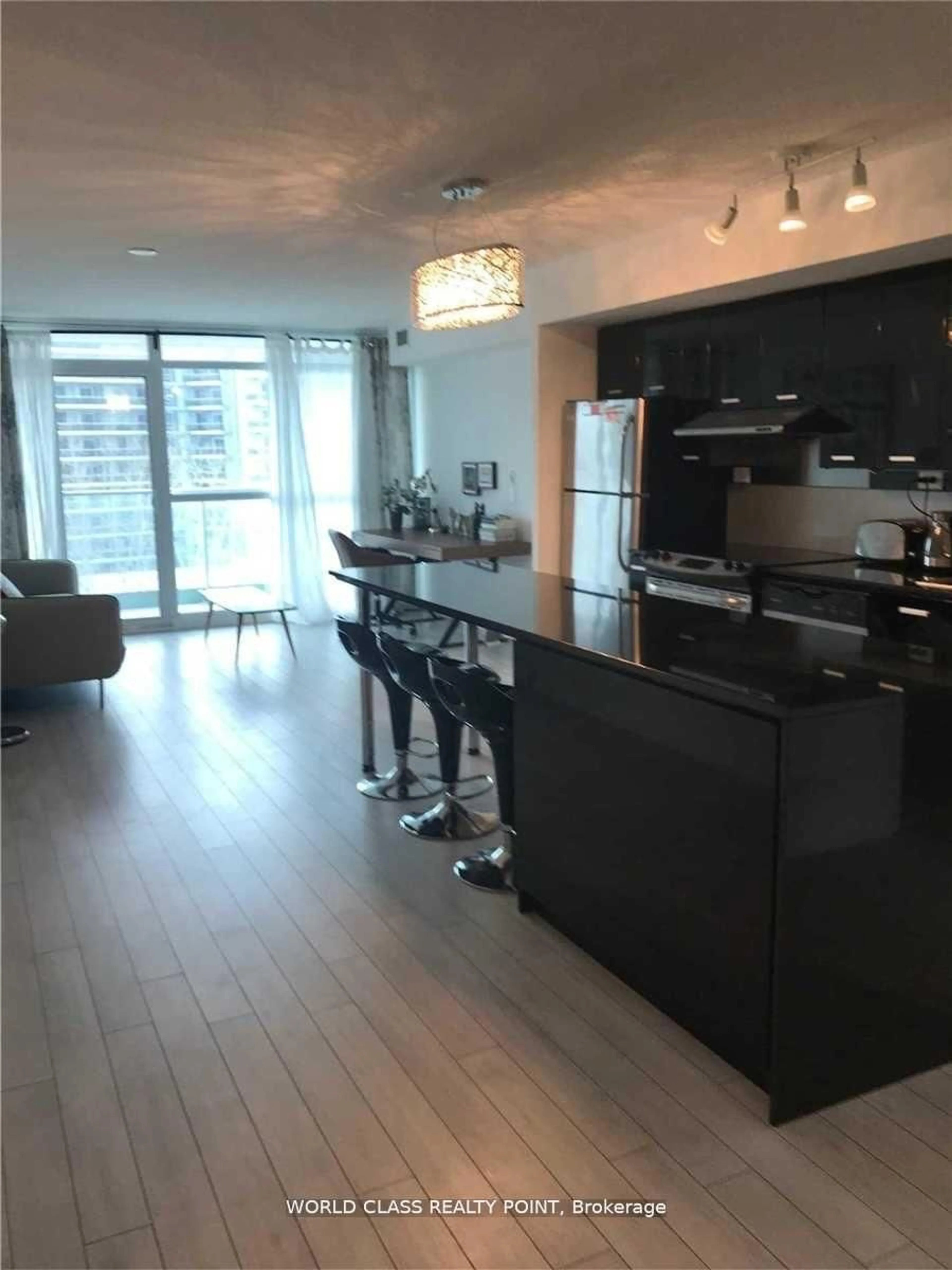 Open concept kitchen, wood/laminate floor for 33 Singer Crt #611, Toronto Ontario M2K 0B4