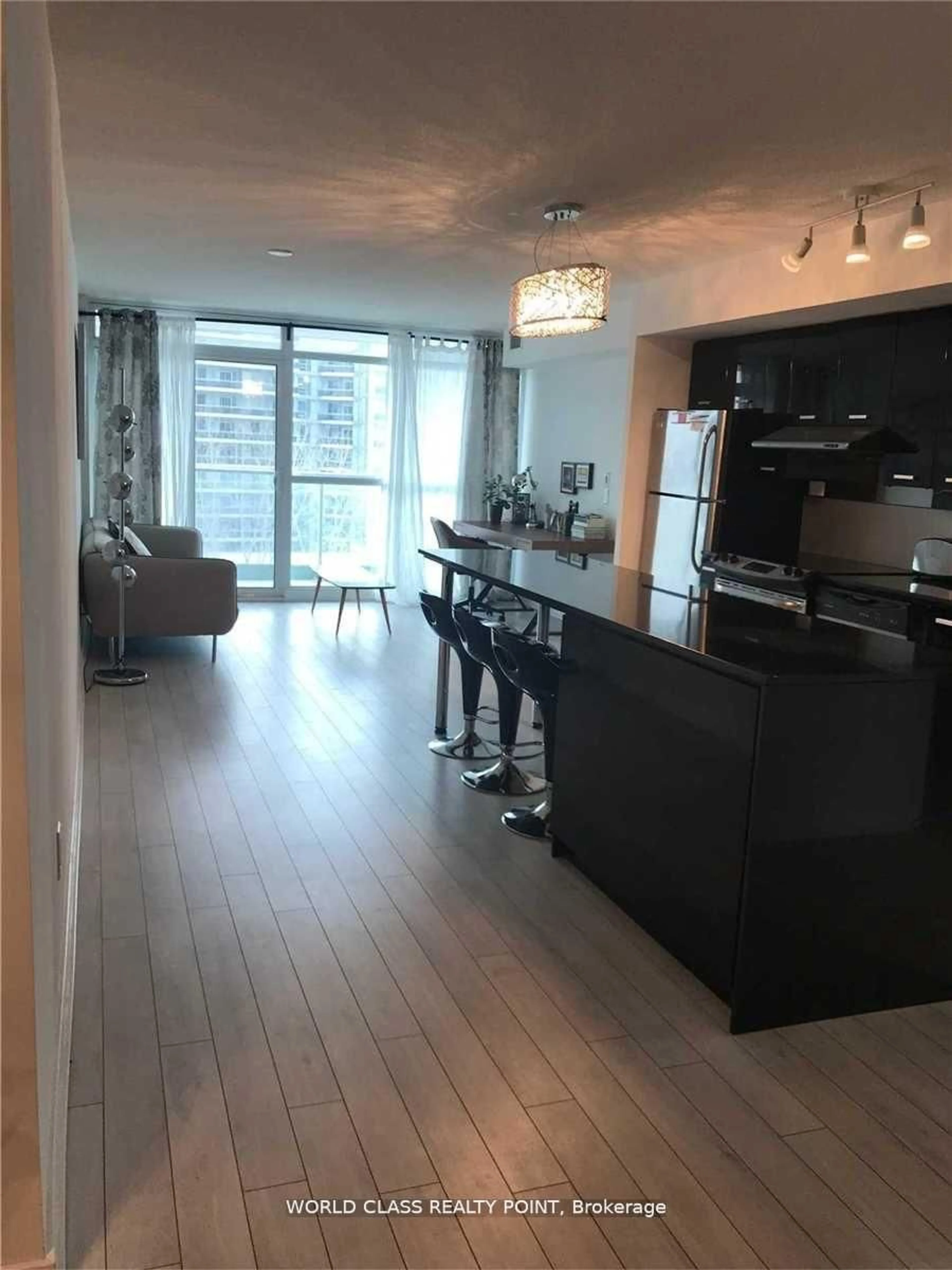 Open concept kitchen, wood/laminate floor for 33 Singer Crt #611, Toronto Ontario M2K 0B4