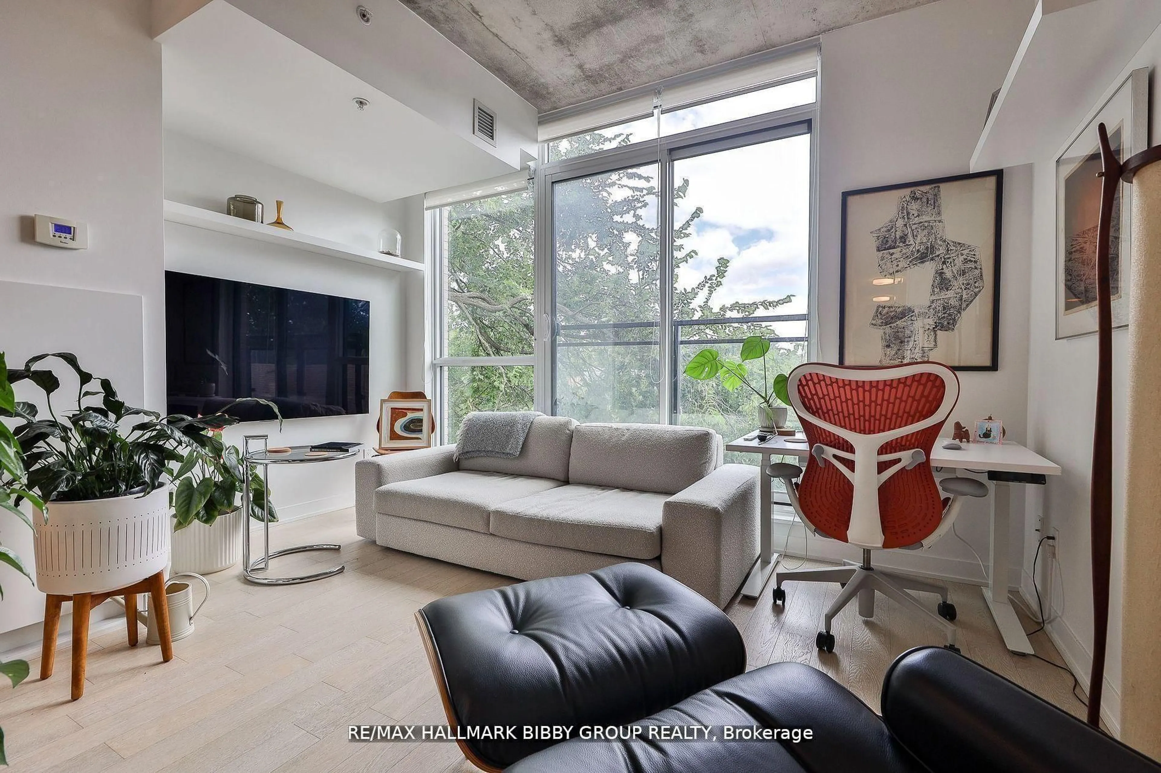 Living room with furniture, unknown for 130 Rusholme Rd #309, Toronto Ontario M6H 1A7