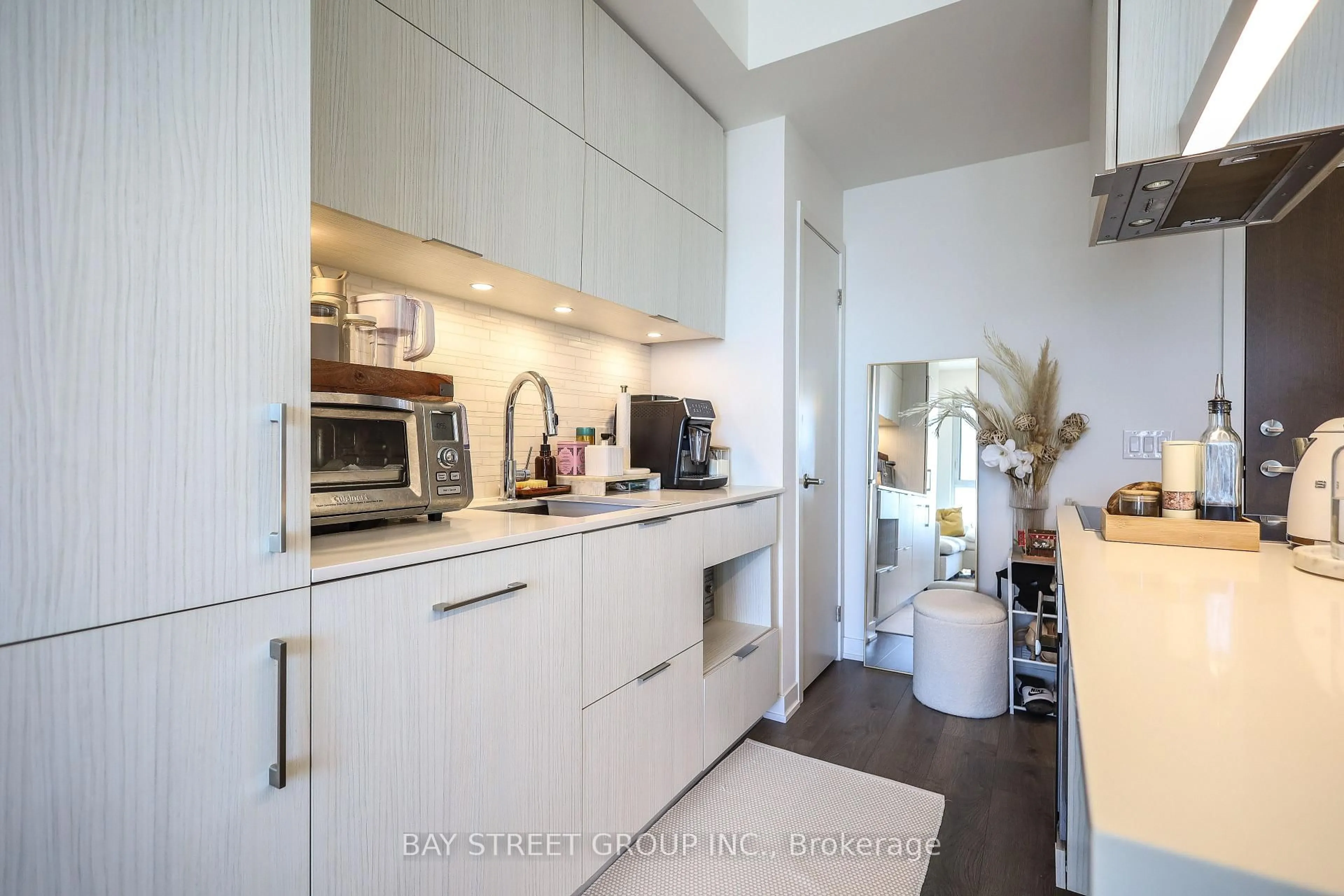 Contemporary kitchen, wood/laminate floor for 20 Richardson St #1204, Toronto Ontario M5A 0S6