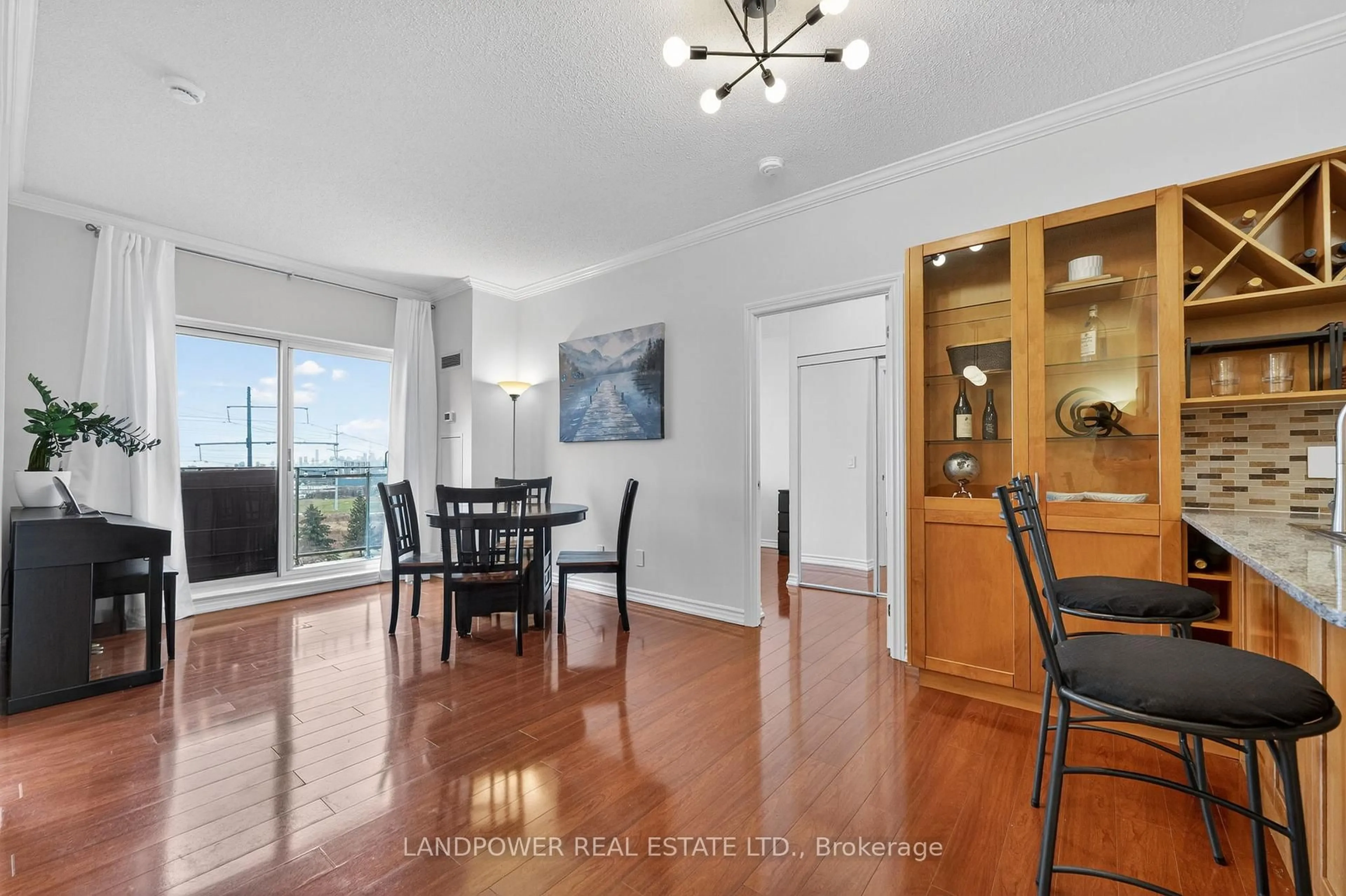 Dining room, wood/laminate floor for 1730 Eglinton Ave E Ave #PH9, Toronto Ontario M4A 2X9