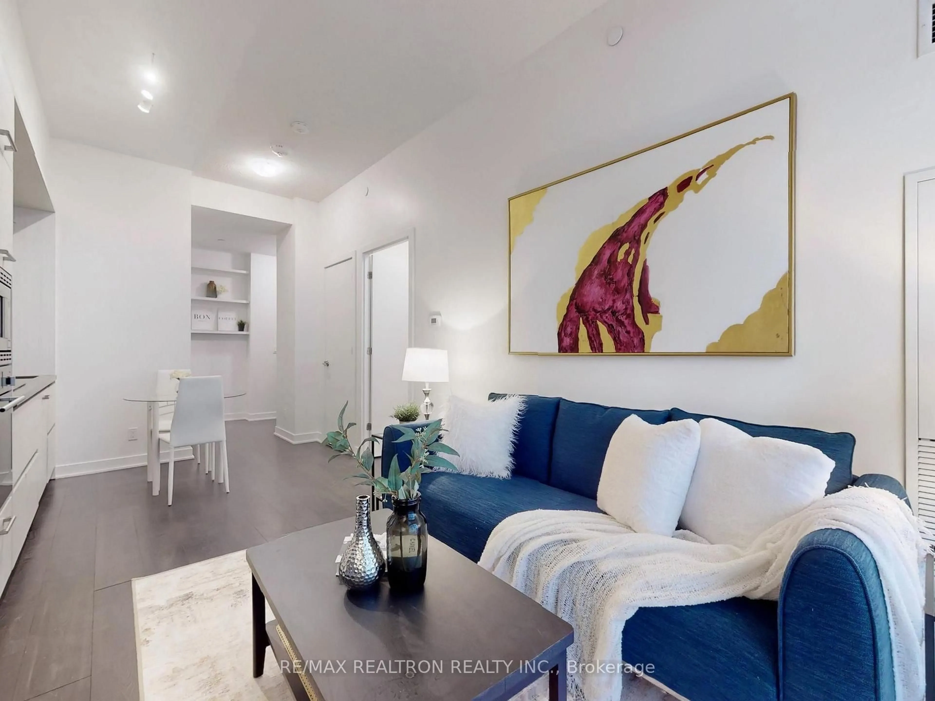 Living room with furniture, unknown for 2221 Yonge St #213, Toronto Ontario M4S 0B8