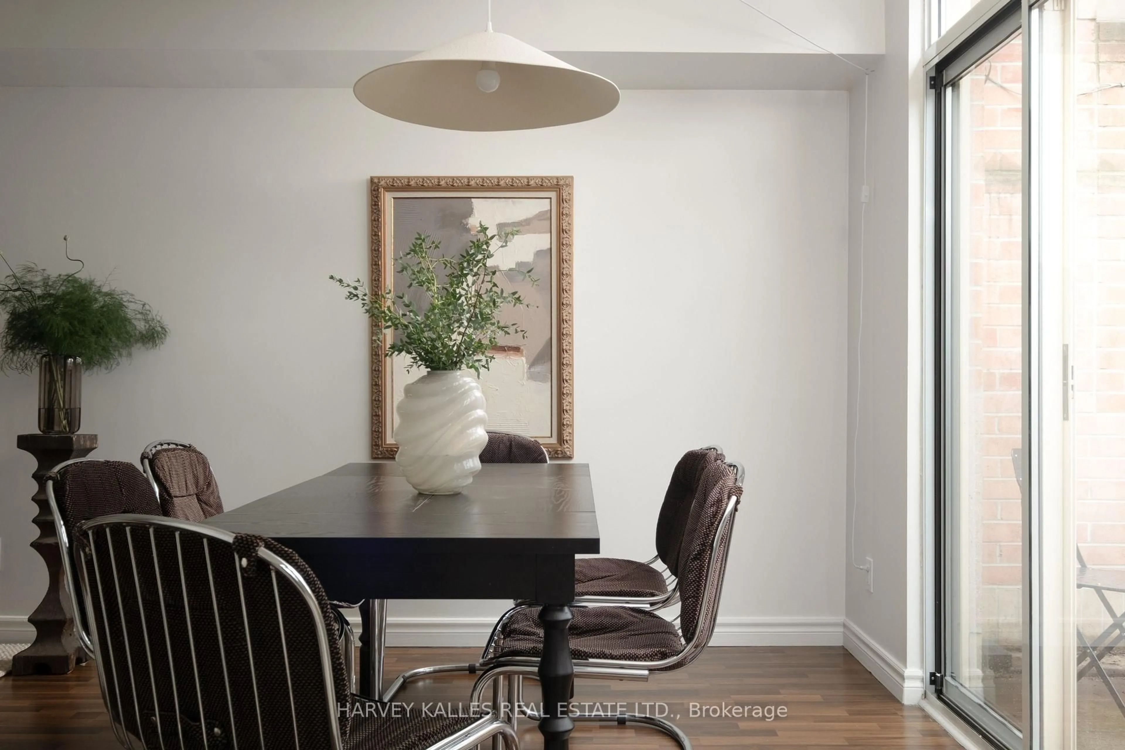 Dining room, wood/laminate floor for 356 McRae Dr #106, Toronto Ontario M4G 4G4