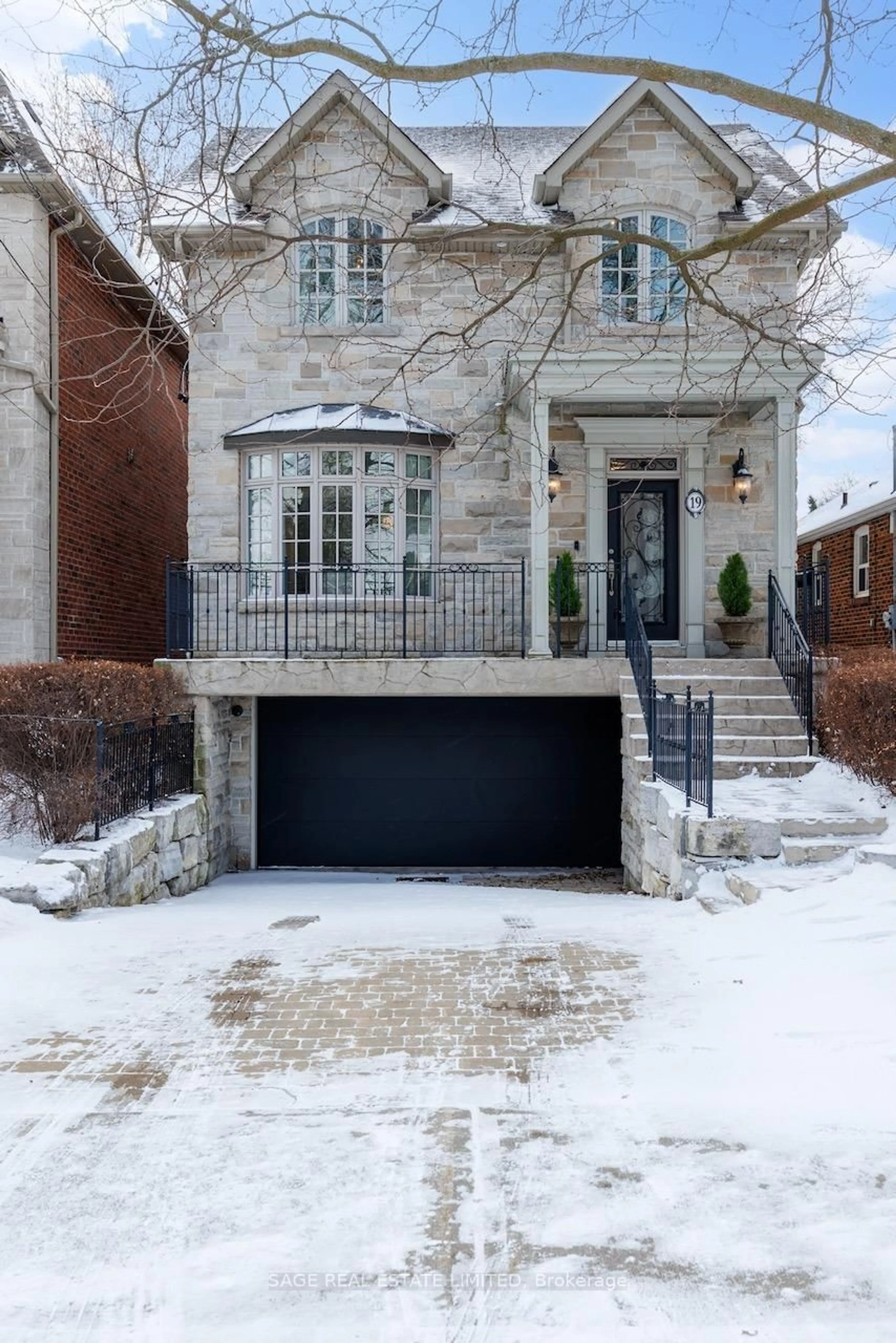 Home with brick exterior material, street for 19 Carmichael Ave, Toronto Ontario M5M 2W5