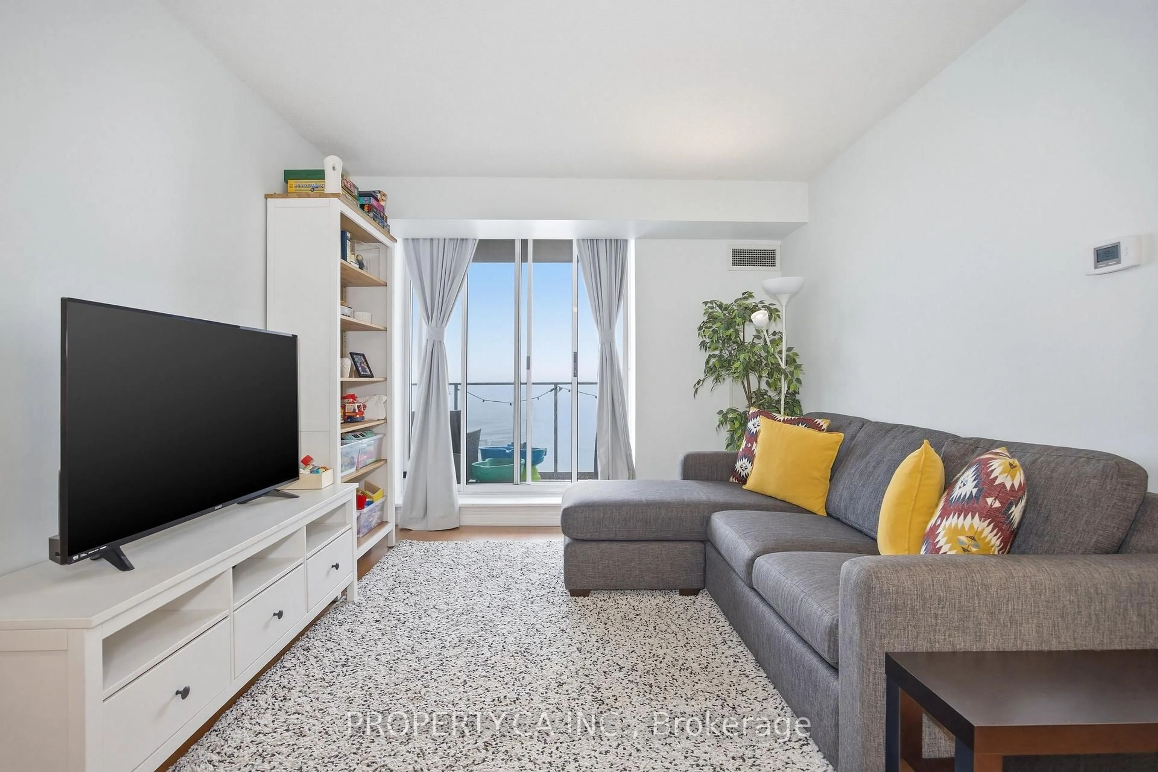 Living room with furniture, unknown for 1389 Bloor St #1311, Toronto Ontario M6P 4J4