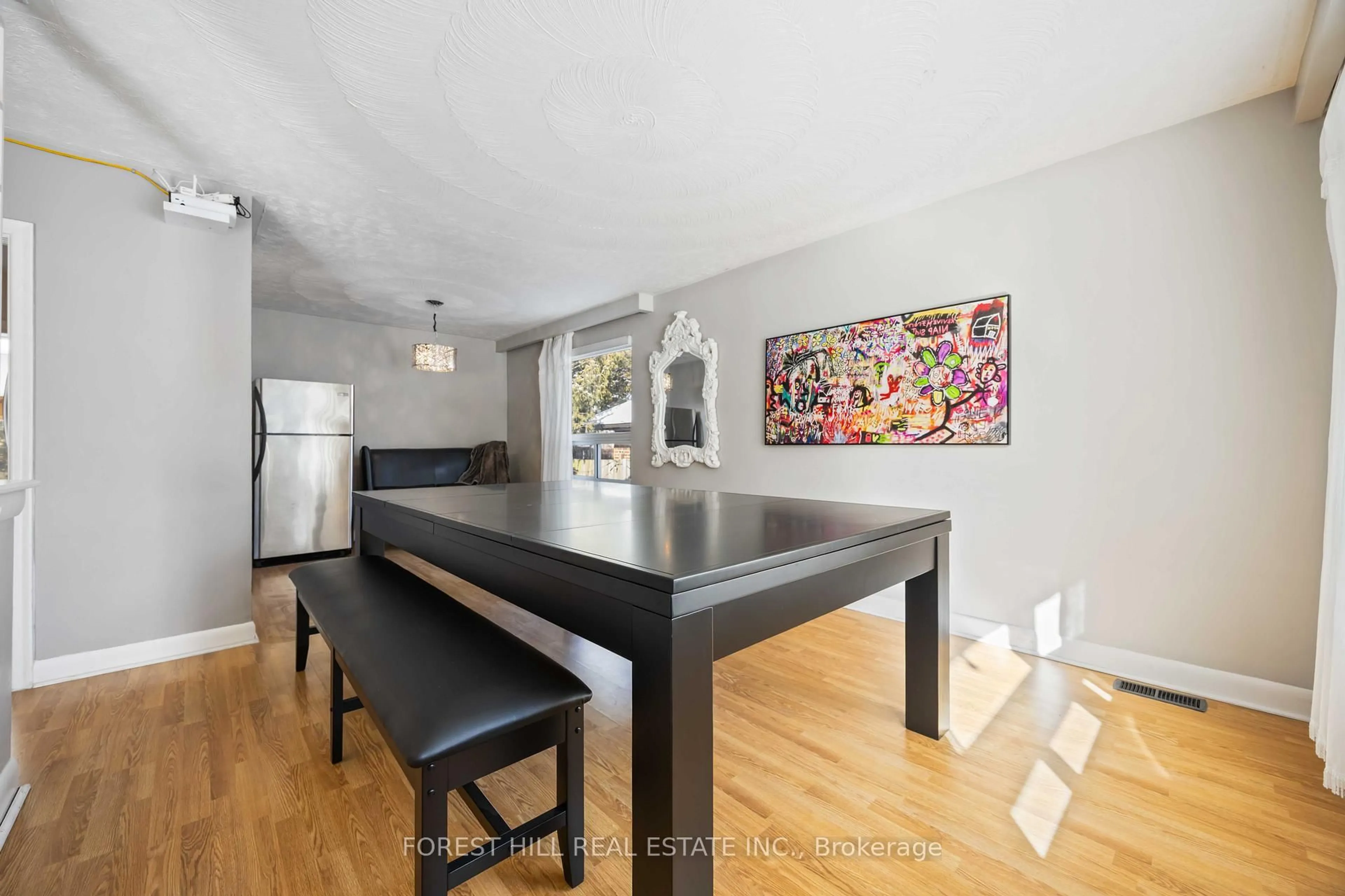 Dining room, wood/laminate floor for 44 Addison Cres, Toronto Ontario M3B 1K8