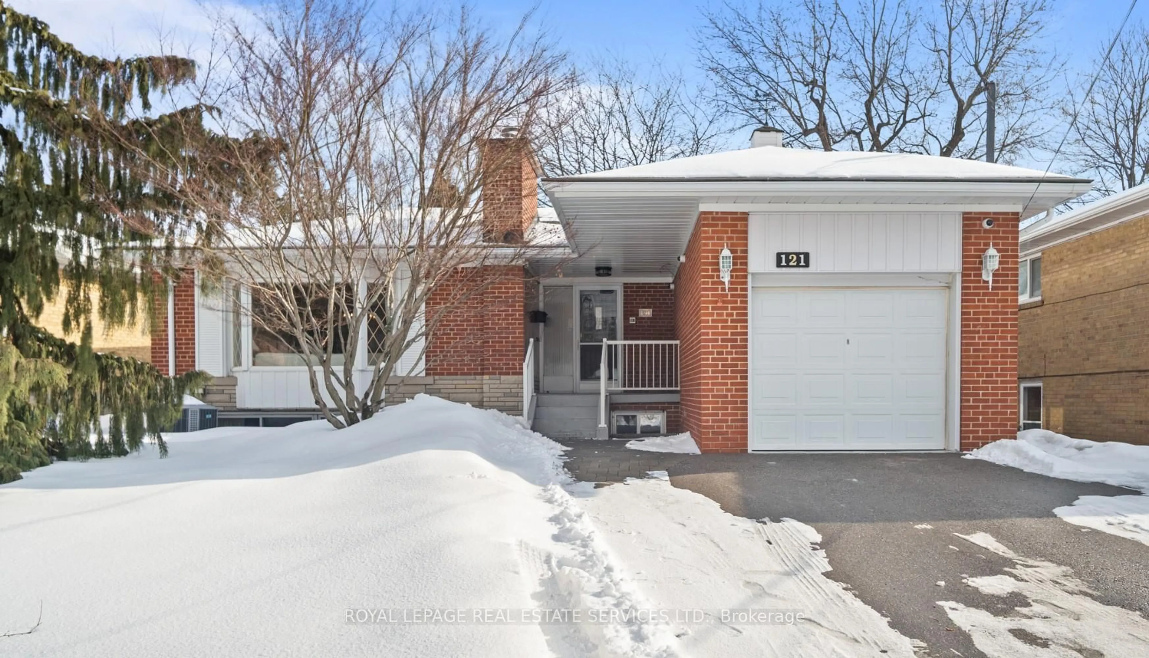 Home with brick exterior material, street for 121 Elvaston Dr, Toronto Ontario M4A 1N8