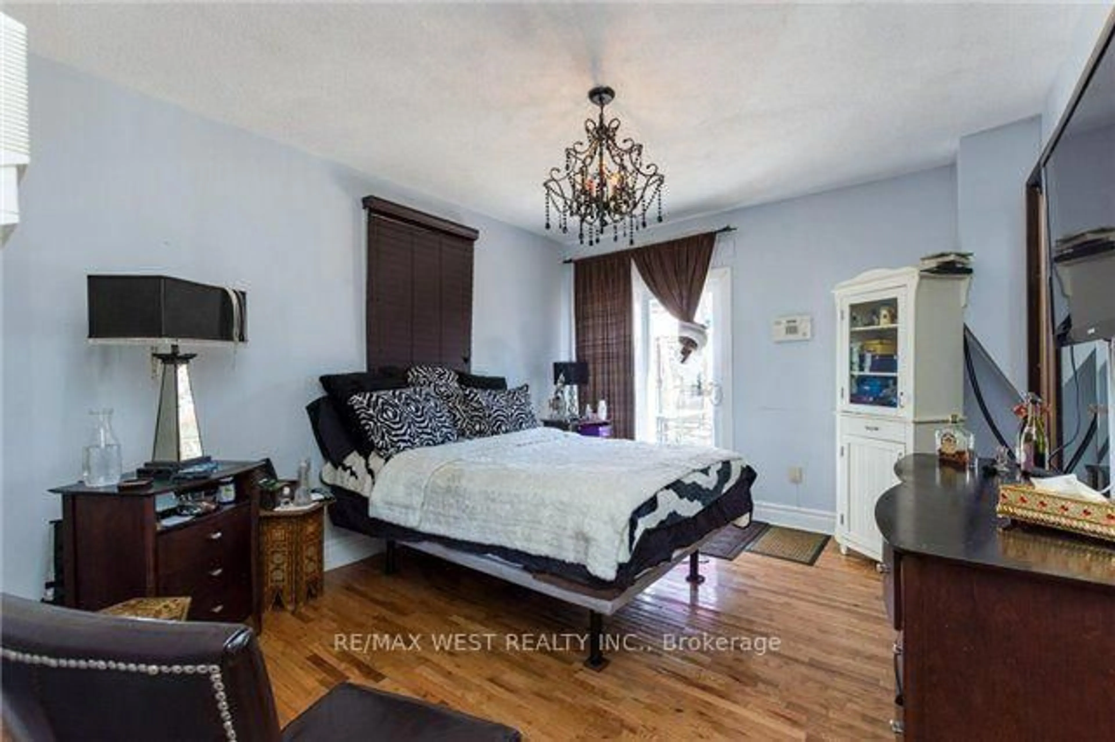 Bedroom with bed, wood/laminate floor for 61 Homewood Ave, Toronto Ontario M4Y 2K4