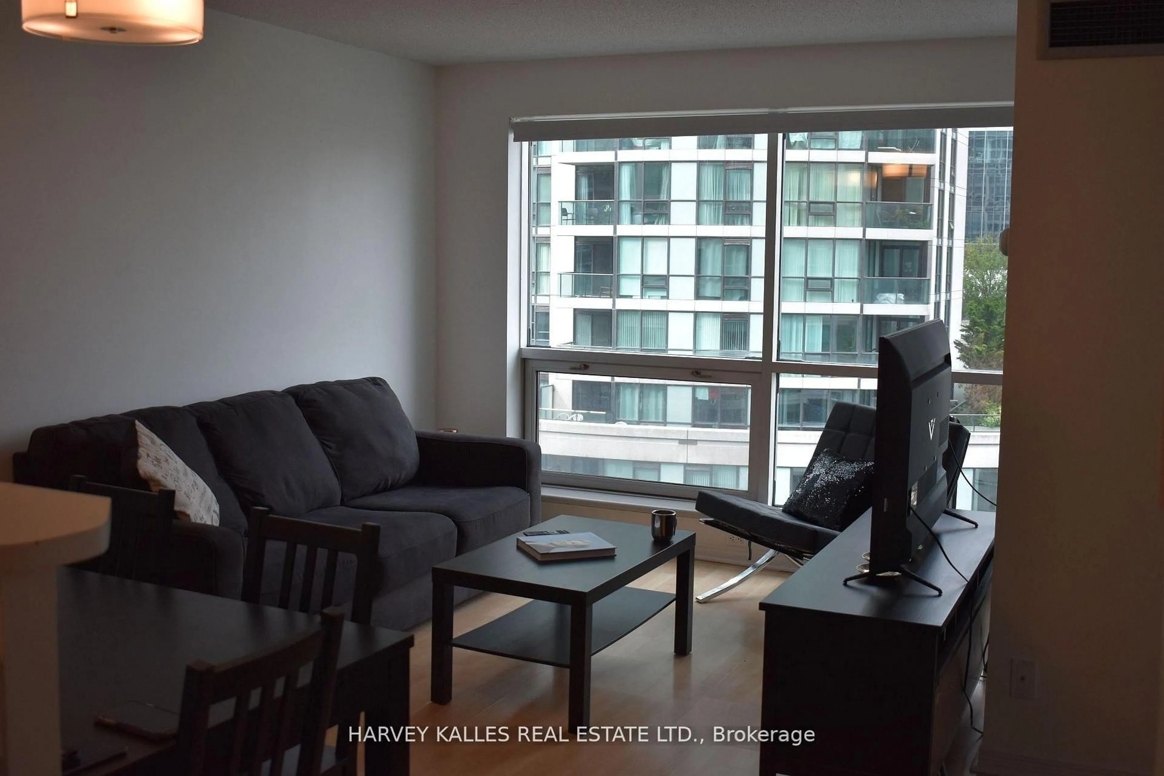 Living room with furniture, wood/laminate floor for 10 Yonge St #705, Toronto Ontario M5J 1R4