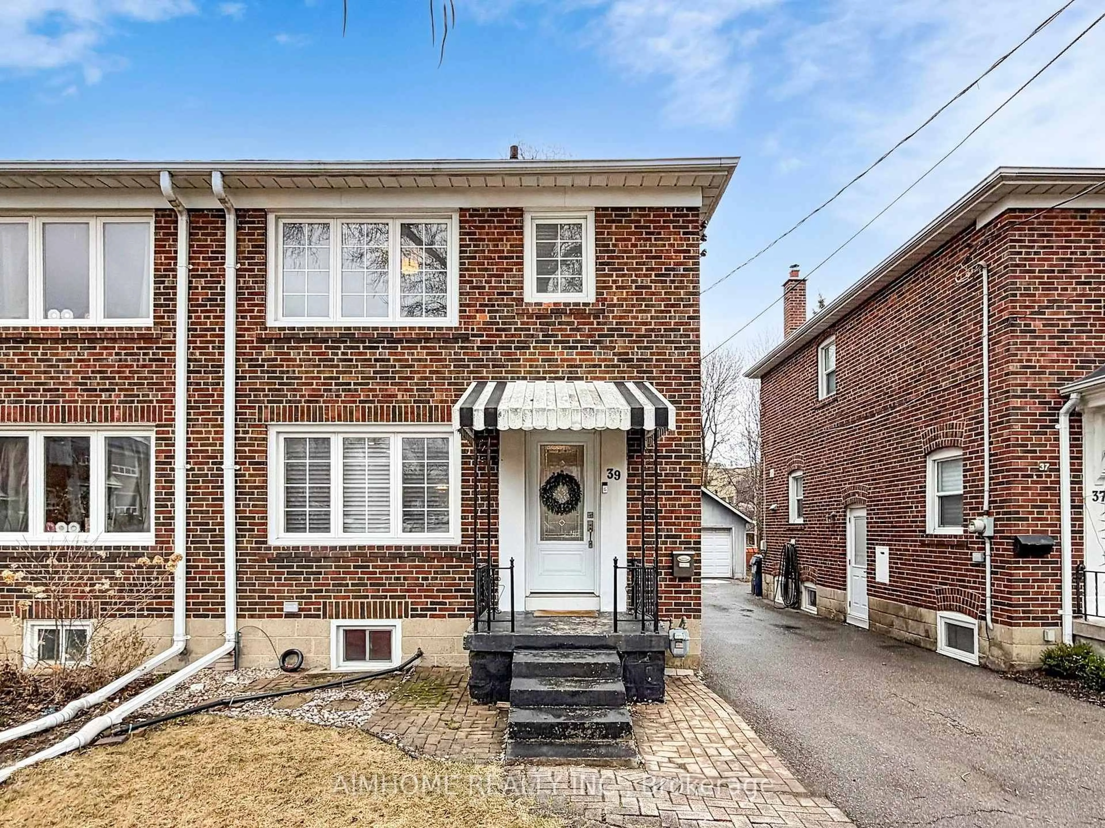 Home with brick exterior material, street for 39 Brentcliffe Rd, Toronto Ontario M4G 3Y4