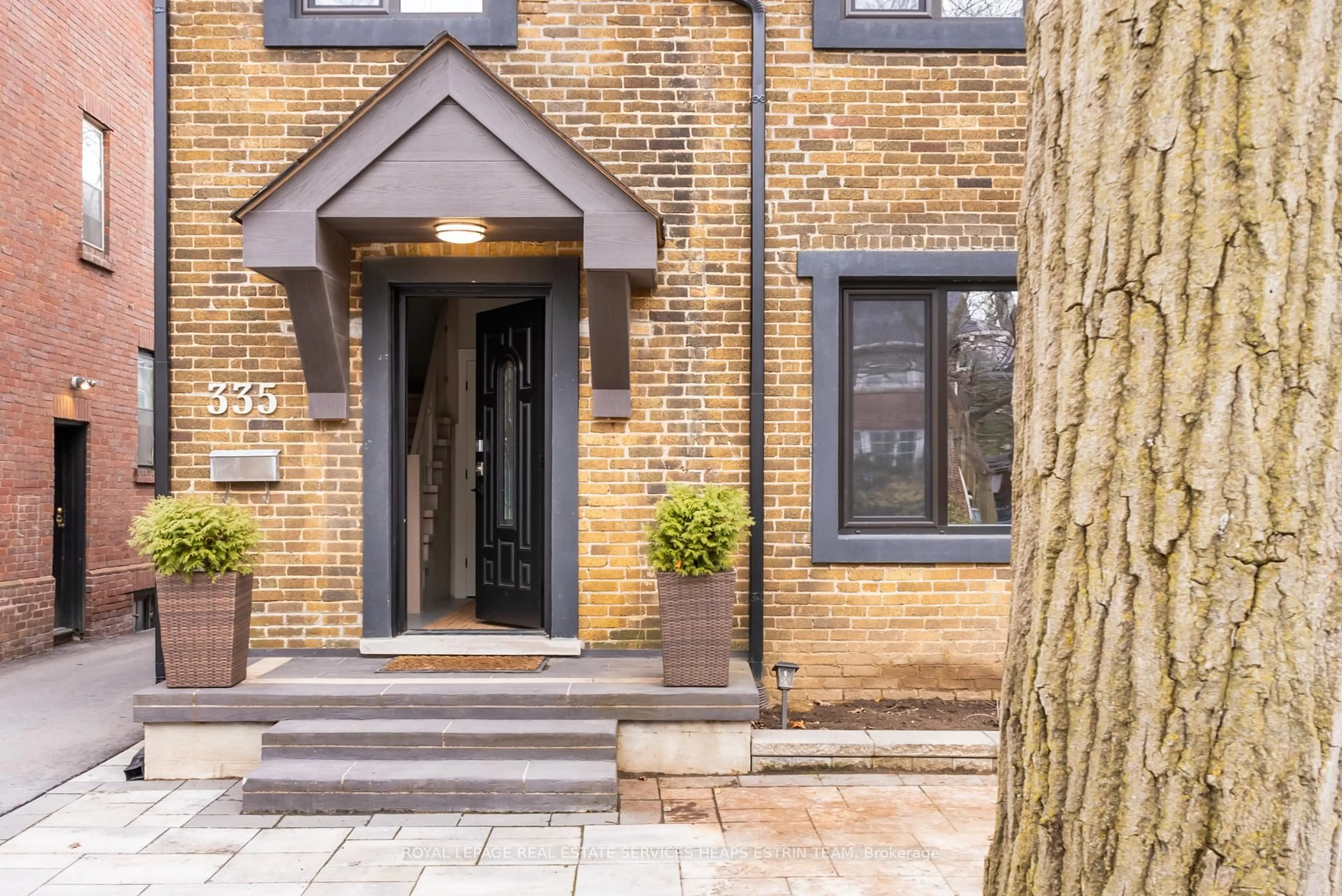 Home with brick exterior material, street for 335 St Clair Ave, Toronto Ontario M4T 1P3