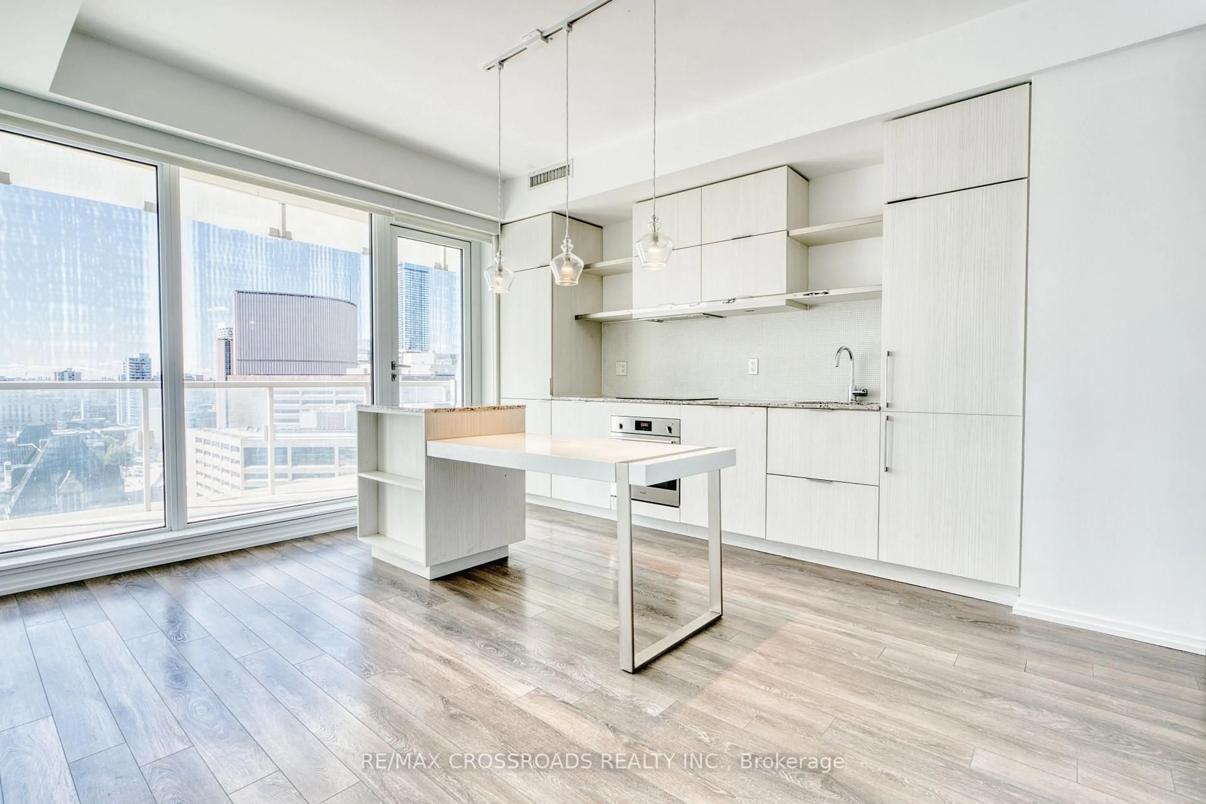 Open concept kitchen, wood/laminate floor for 197 Yonge St #1510, Toronto Ontario M5B 0C1