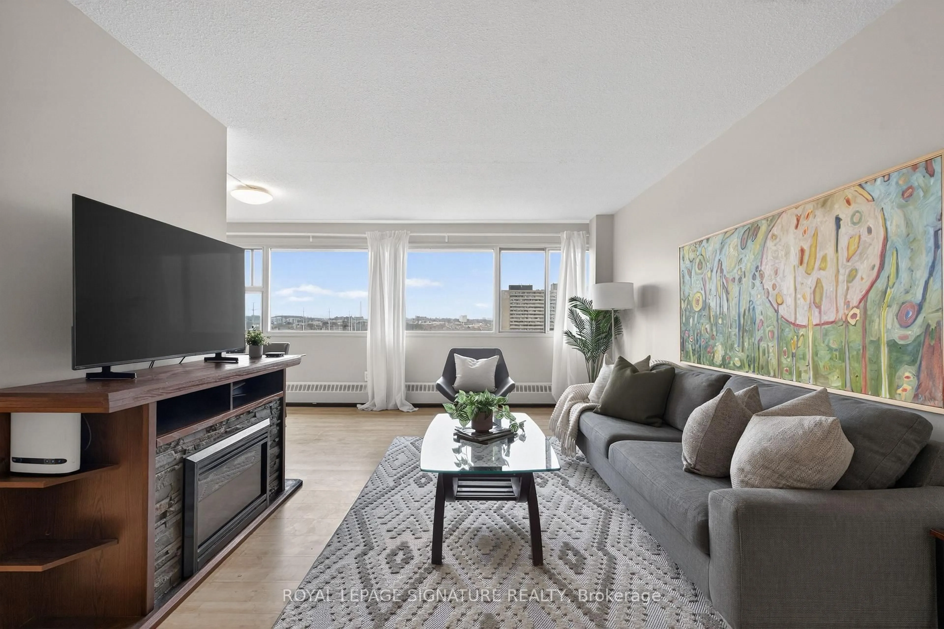 Living room with furniture, unknown for 725 Don Mills Rd #1202, Toronto Ontario M3C 1S6