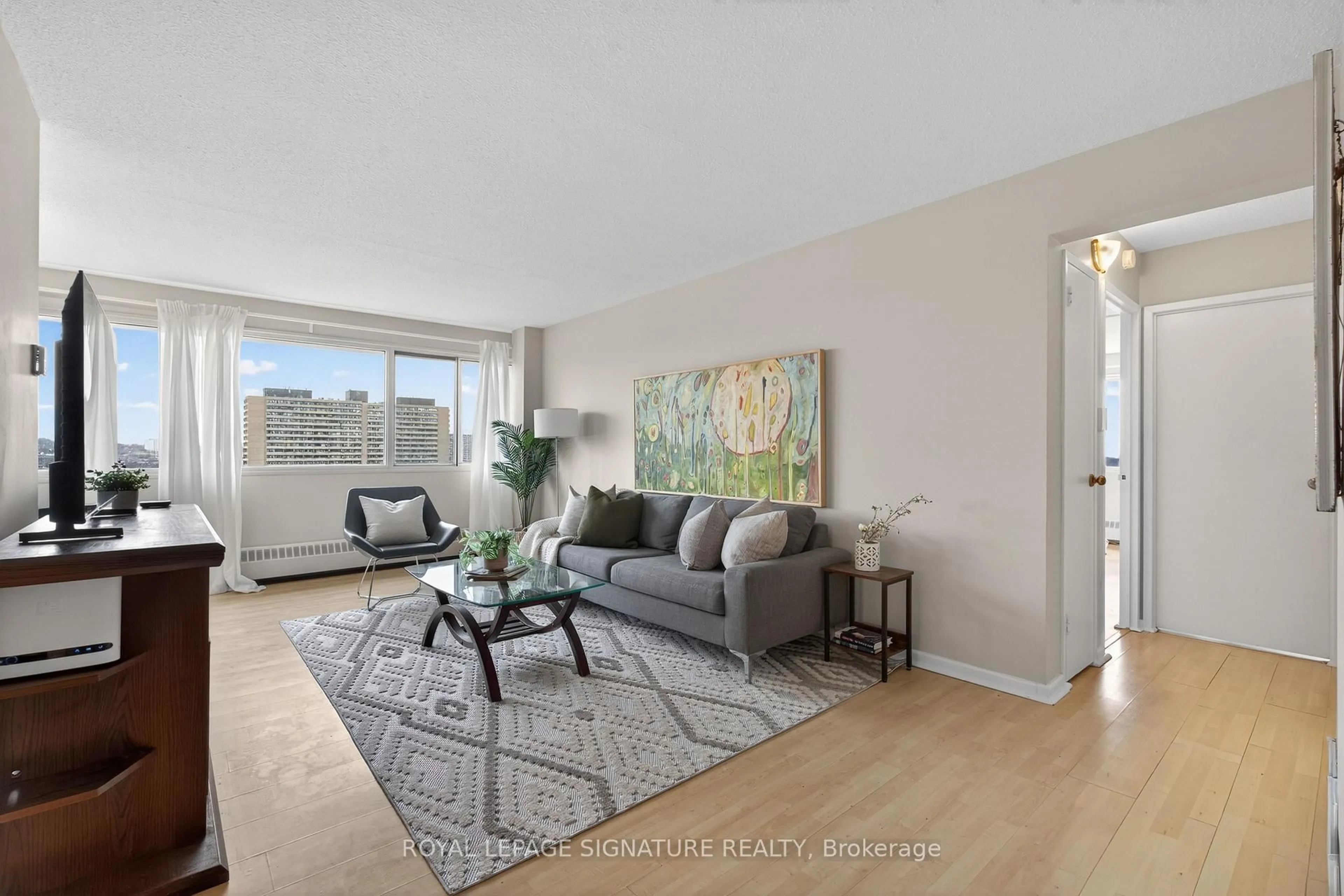 Living room with furniture, unknown for 725 Don Mills Rd #1202, Toronto Ontario M3C 1S6