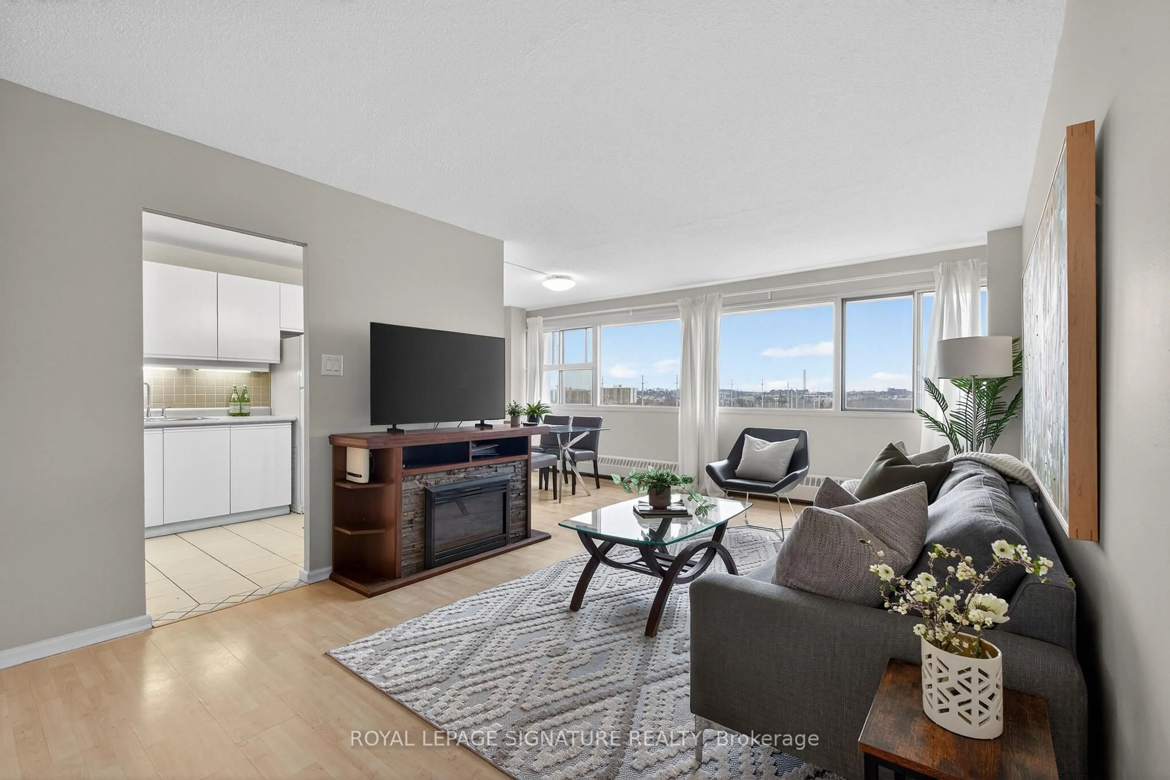 Living room with furniture, unknown for 725 Don Mills Rd #1202, Toronto Ontario M3C 1S6