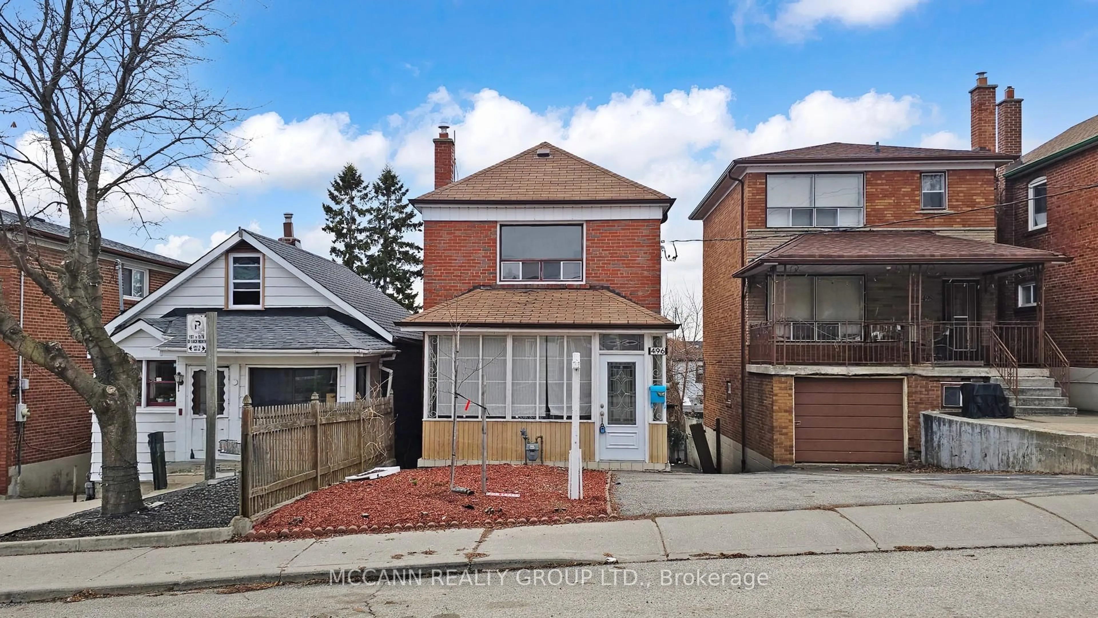 Home with brick exterior material, street for 496 Northcliffe Blvd, Toronto Ontario M6E 3L5