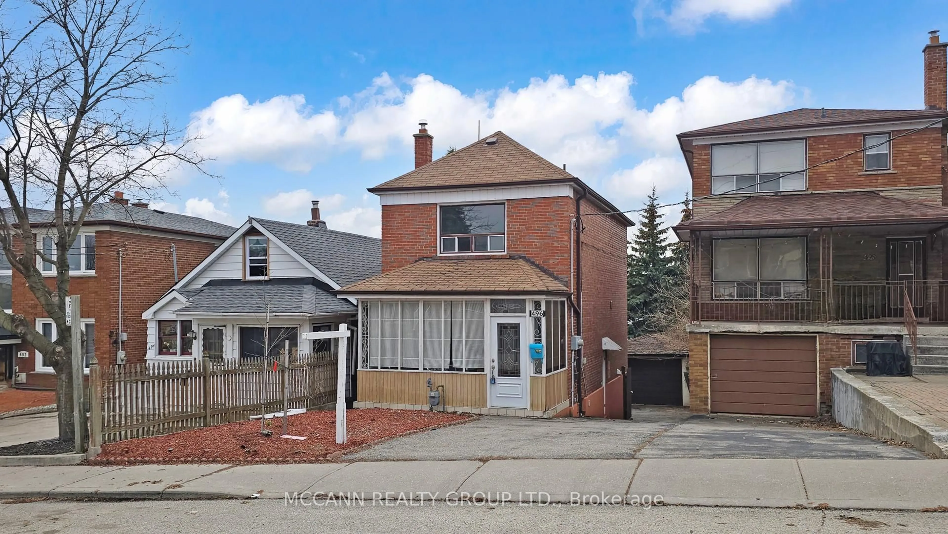 Home with brick exterior material, street for 496 Northcliffe Blvd, Toronto Ontario M6E 3L5