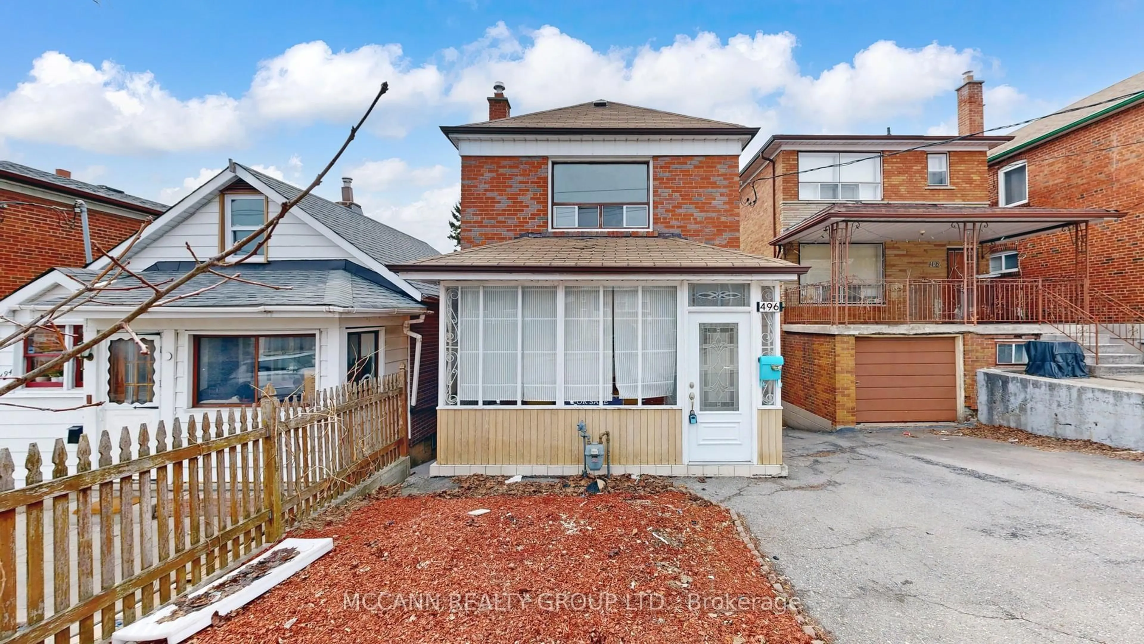 Home with brick exterior material, street for 496 Northcliffe Blvd, Toronto Ontario M6E 3L5