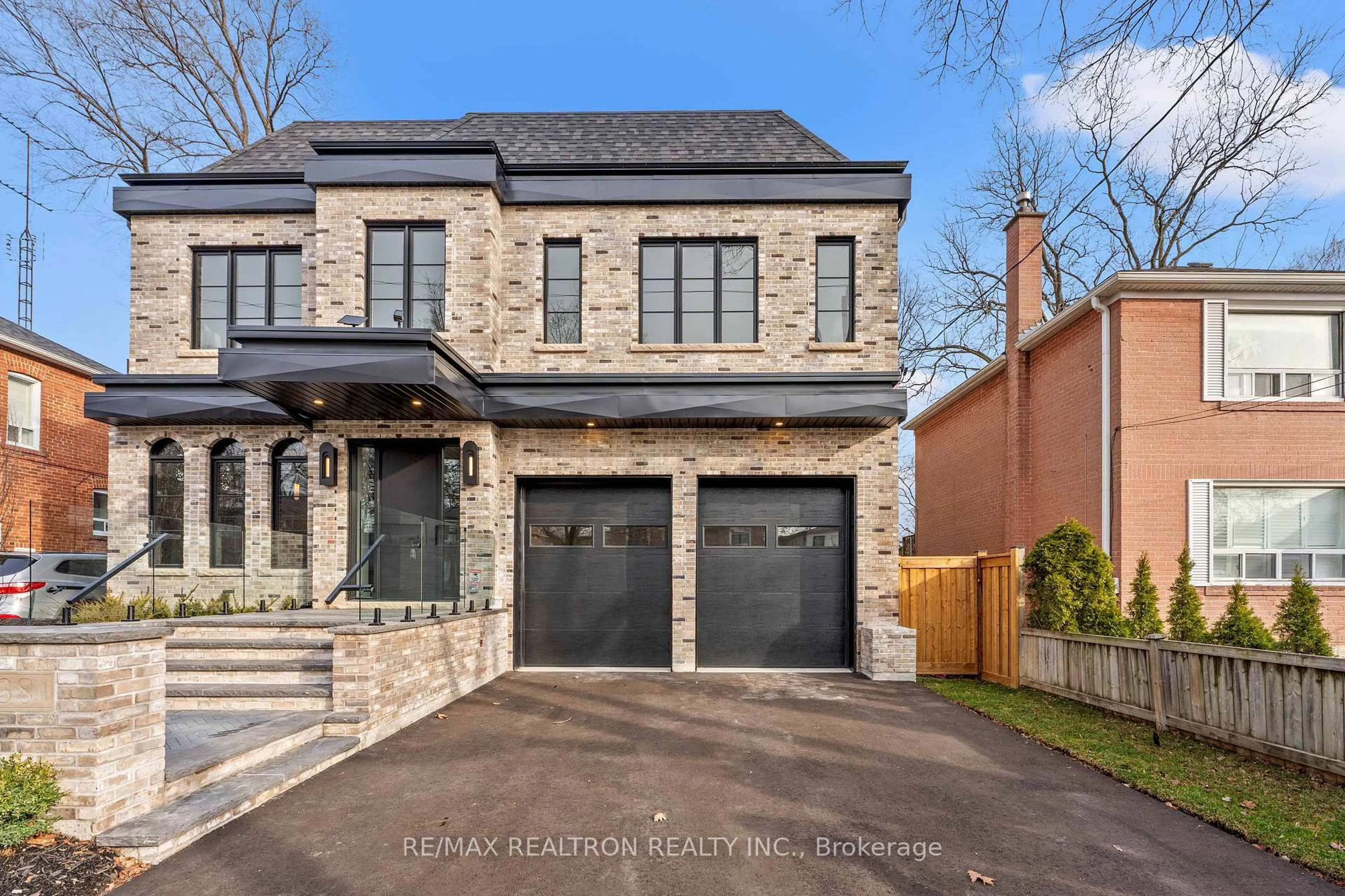Home with brick exterior material, street for 38 Ridgevale Dr, Toronto Ontario M6A 1K8