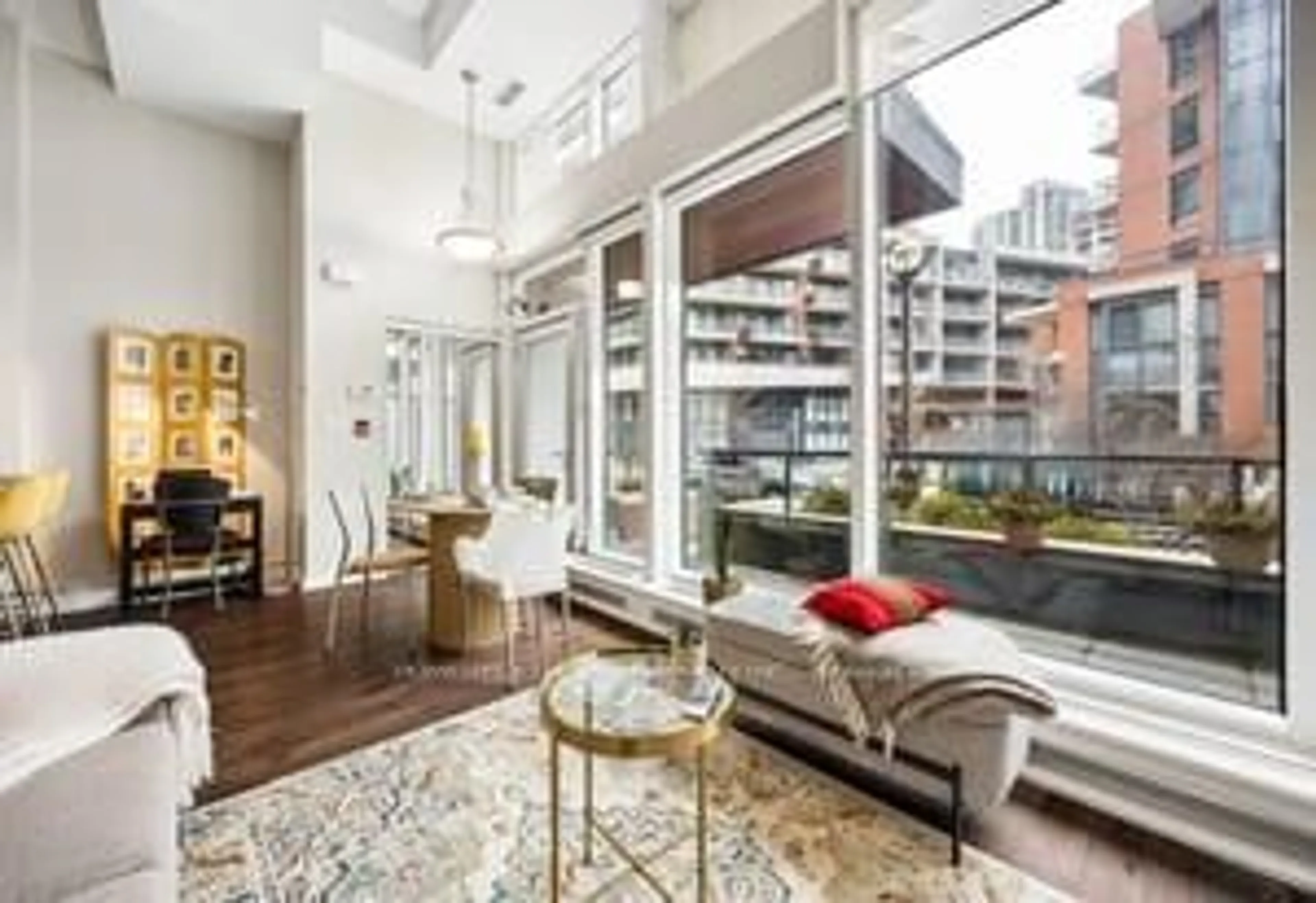 Living room with furniture, unknown for 20 Bruyeres Mews #Th10, Toronto Ontario M5V 0G8