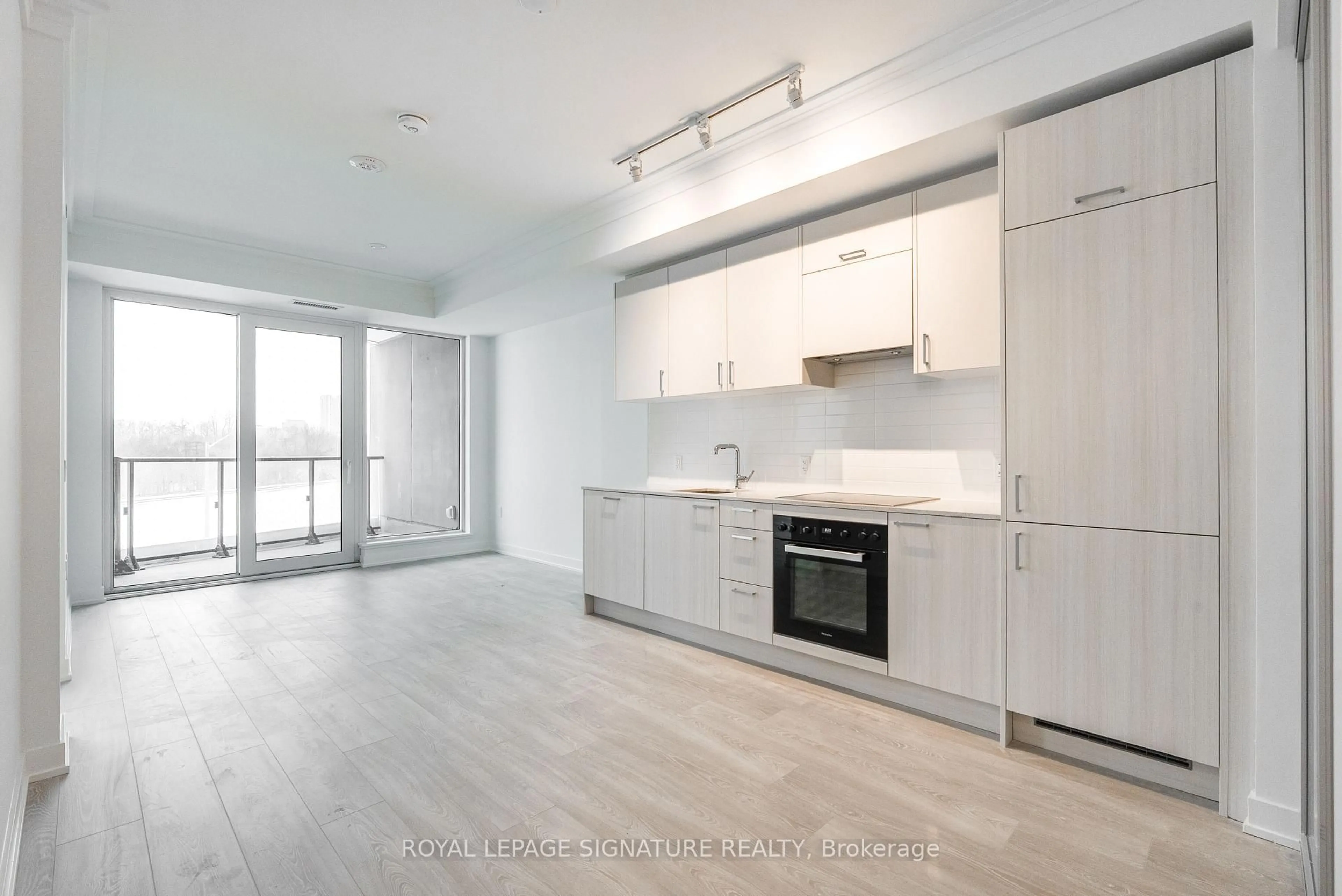Open concept kitchen, unknown for 1 Kyle Lowry Rd #309, Toronto Ontario M3C 0S6