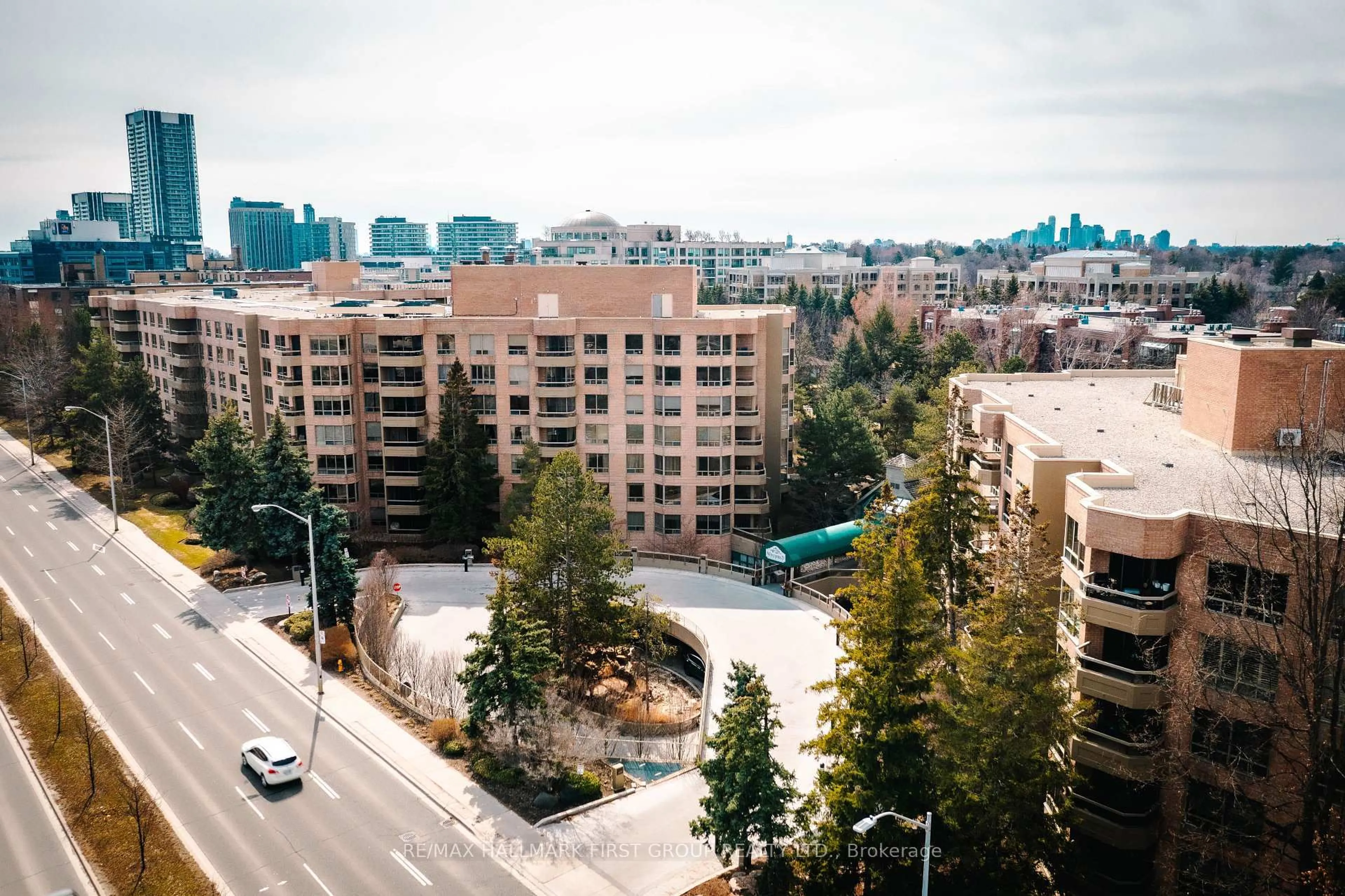 A pic from outside/outdoor area/front of a property/back of a property/a pic from drone, city buildings view from balcony for 1200 Don Mills Rd #303, Toronto Ontario M3B 3N8