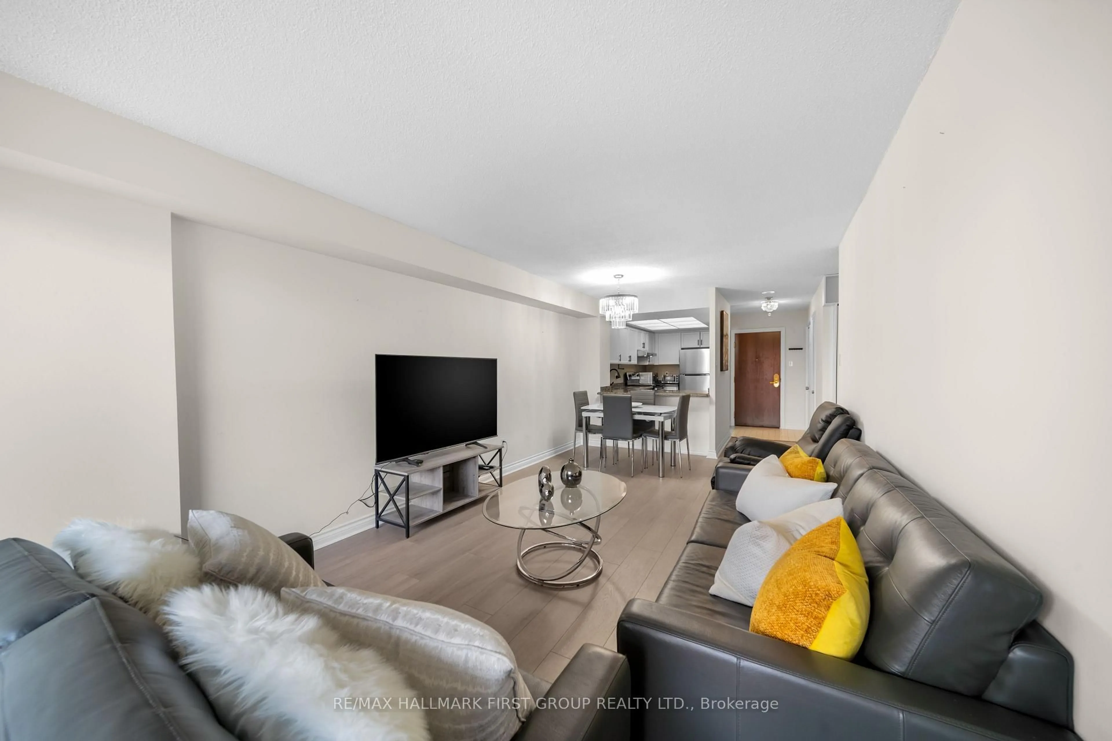 Living room with furniture, unknown for 1200 Don Mills Rd #303, Toronto Ontario M3B 3N8