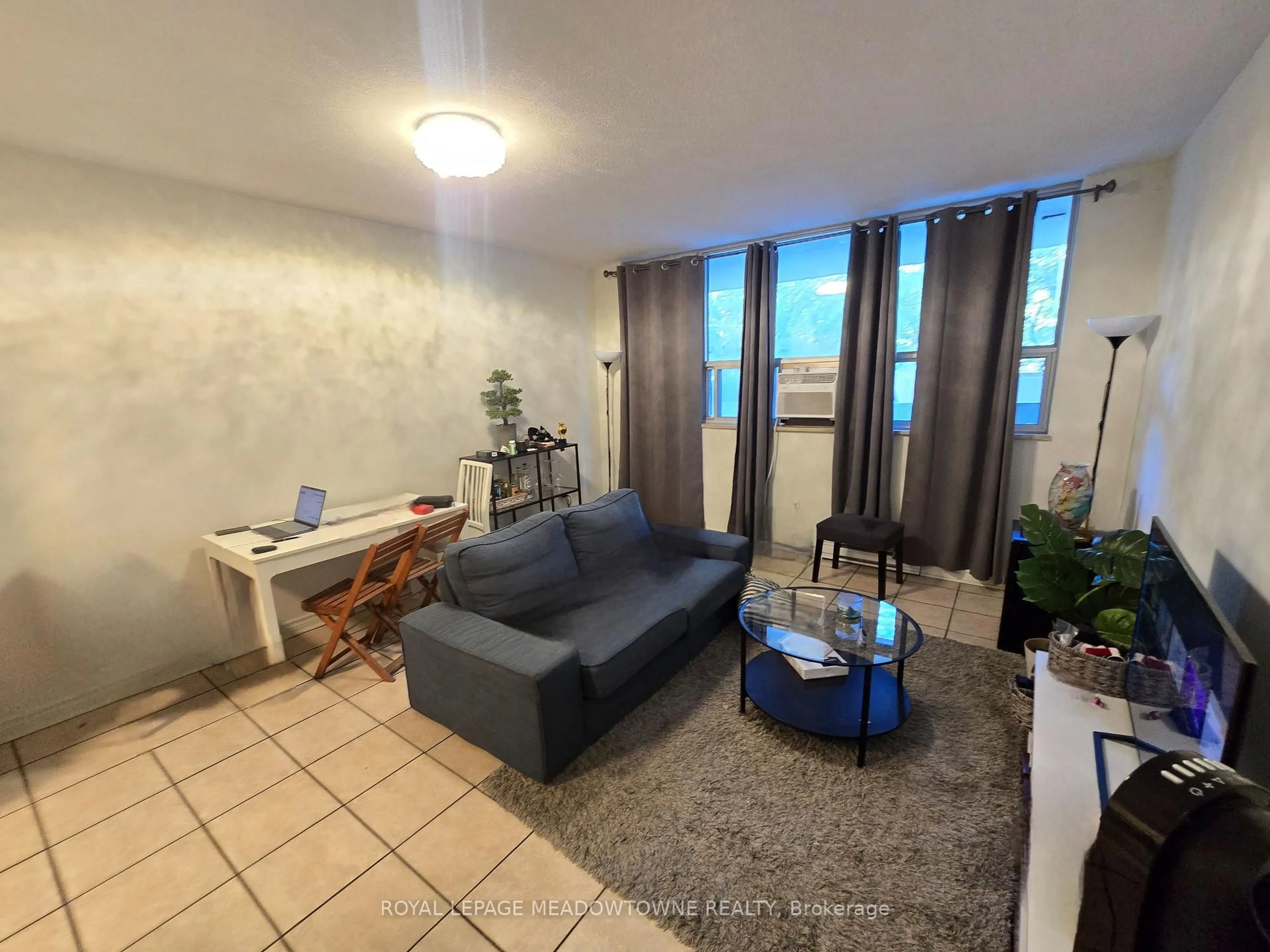 Living room with furniture, unknown for 40 Homewood Ave #103, Toronto Ontario M4Y 2K2