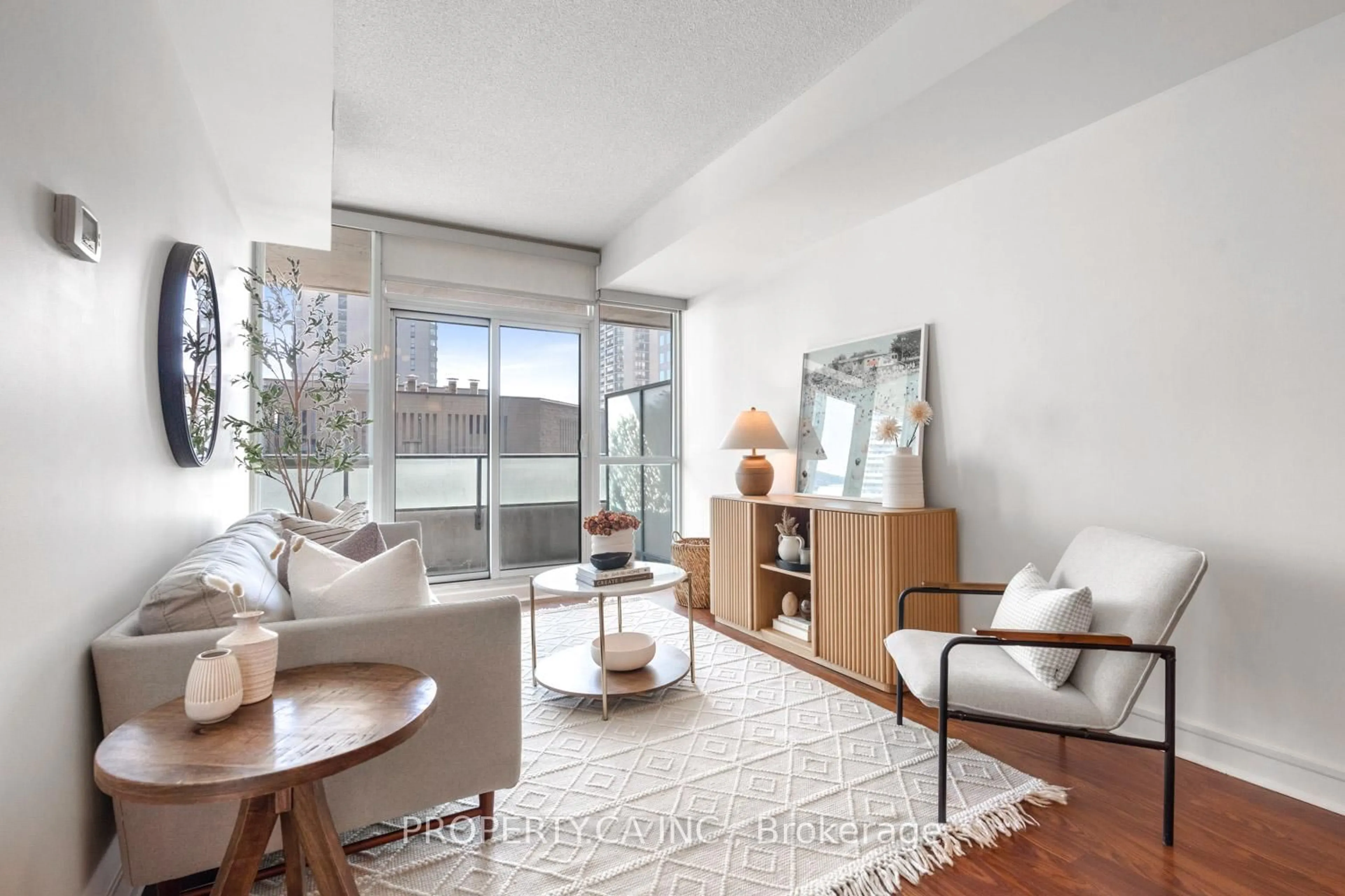 Living room with furniture, unknown for 33 Bay St #414, Toronto Ontario M5J 2Z3