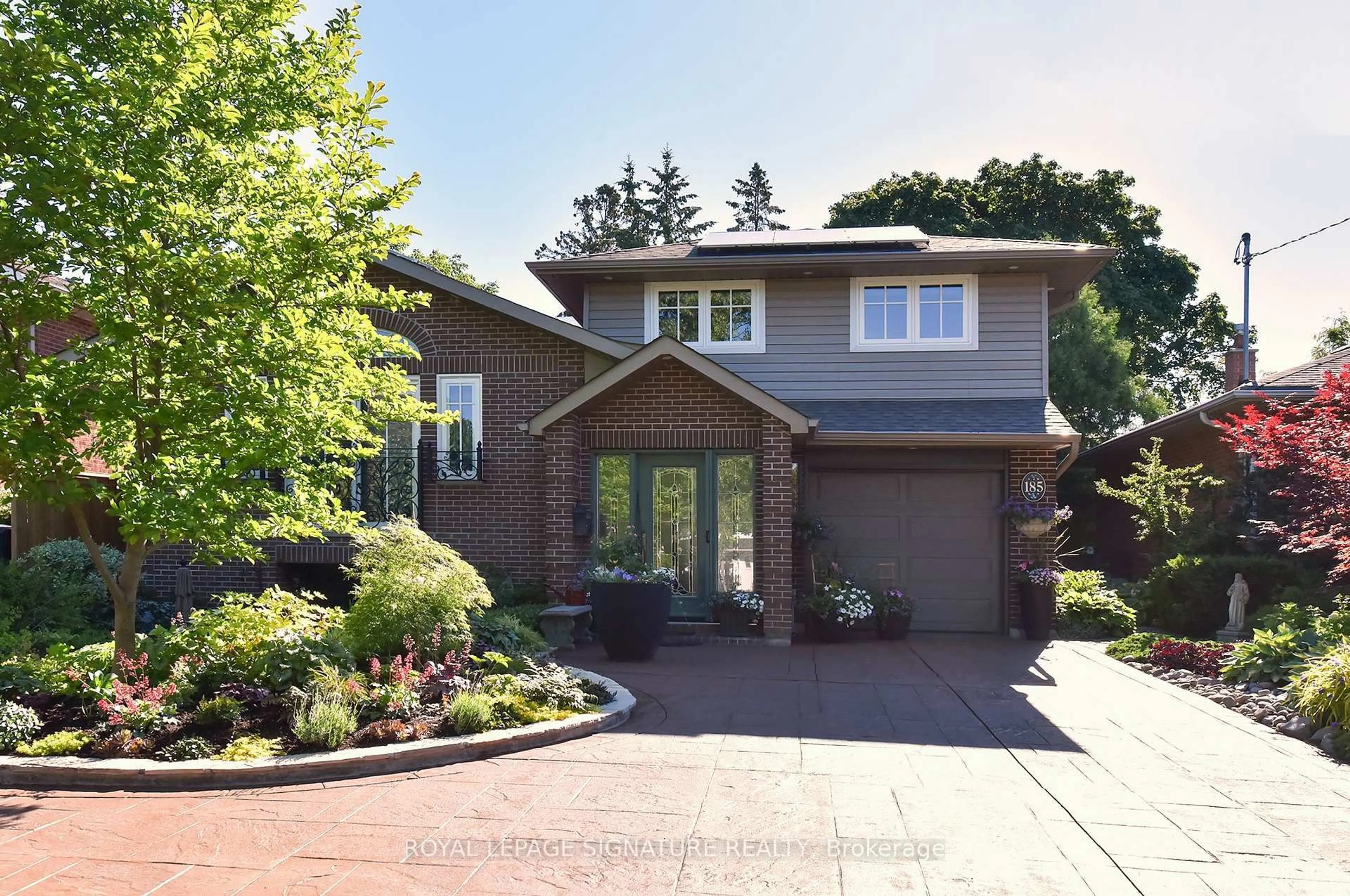 Home with brick exterior material, street for 185 Sloane Ave, Toronto Ontario M4A 2C5